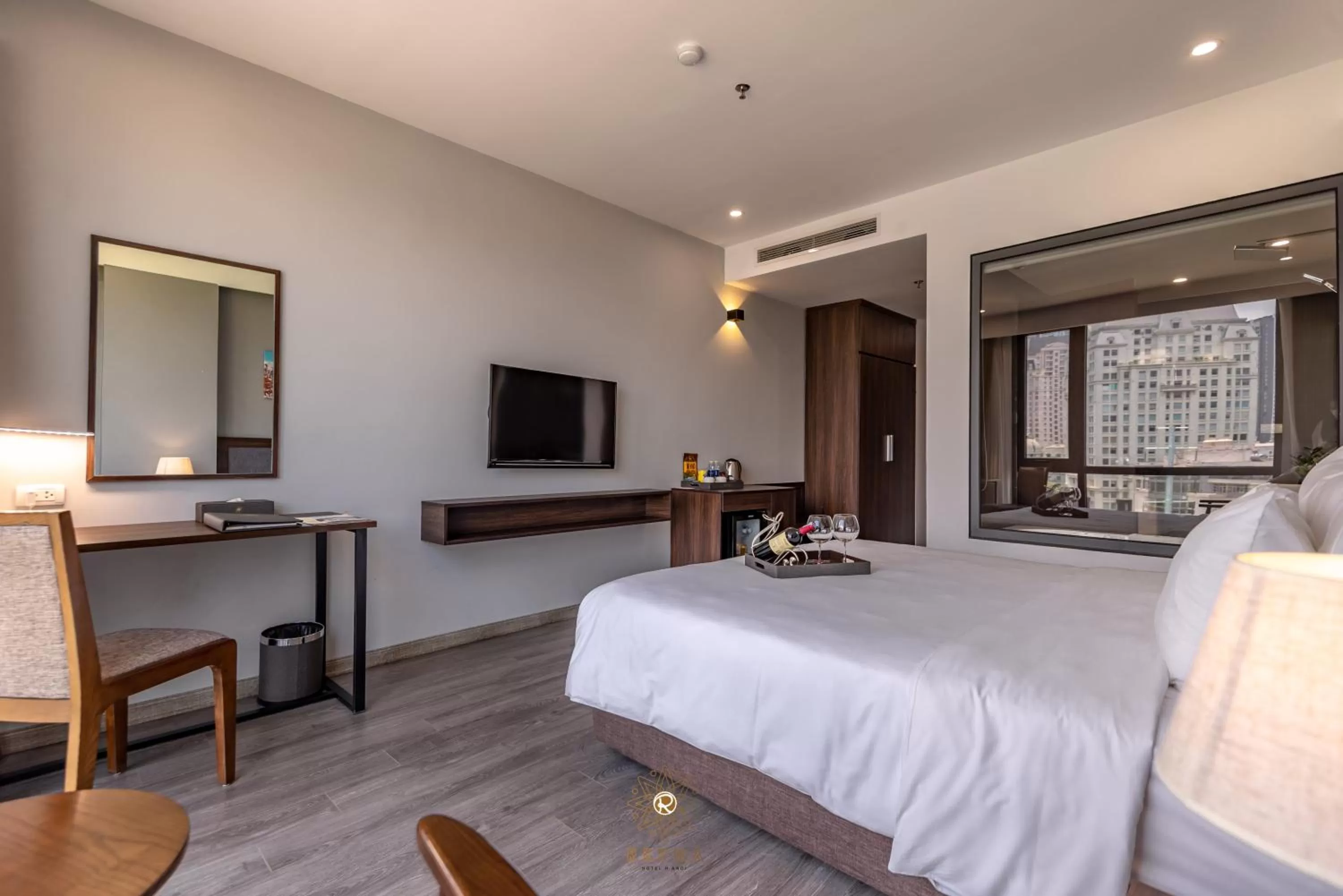 Communal lounge/ TV room, Bed in Reyna Hotel Hanoi & Spa