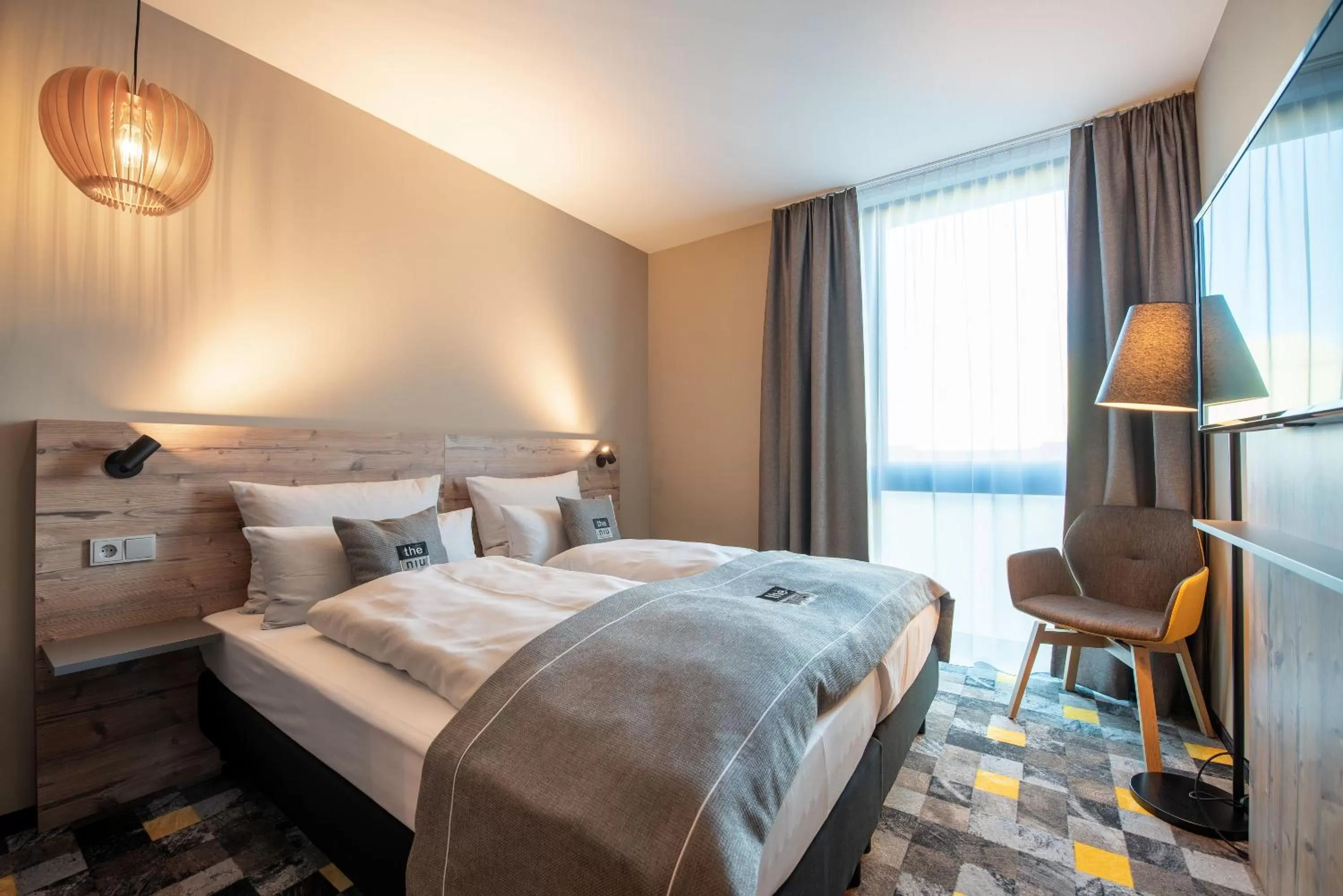 Photo of the whole room, Bed in Holiday Inn - the niu, Timber Esslingen by IHG