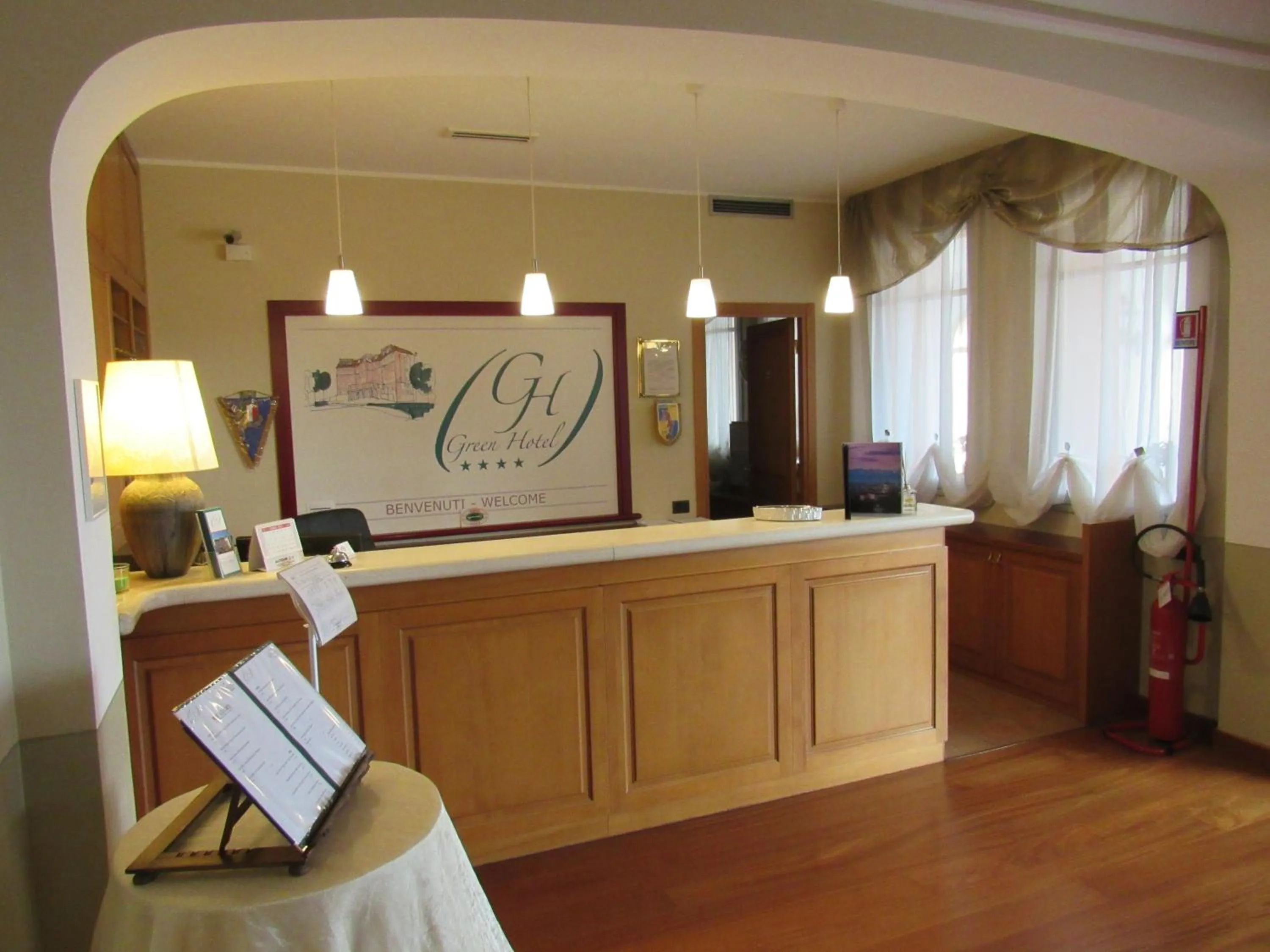 Property logo or sign in Green Hotel