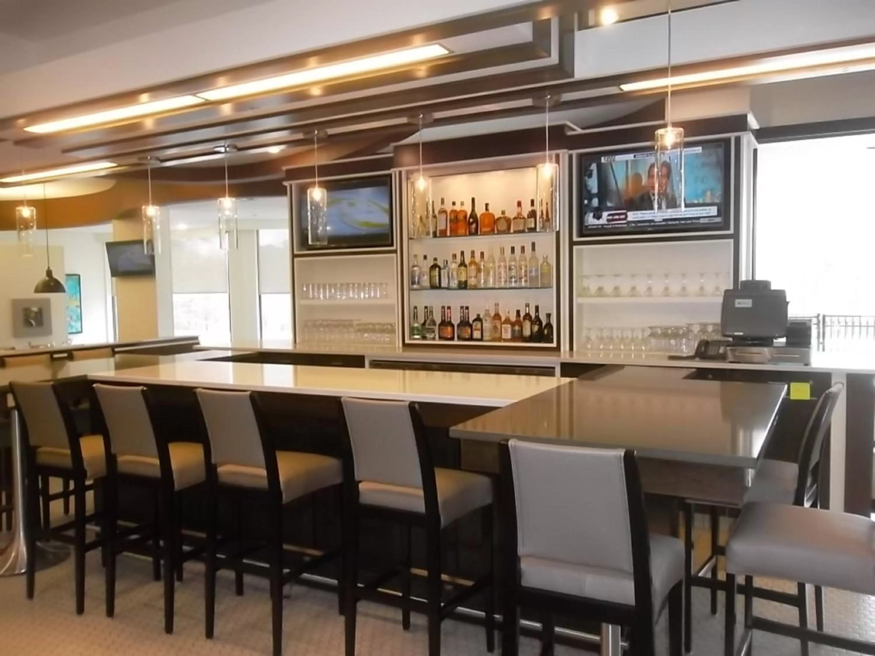 Lounge or bar in Holiday Inn Greensboro Coliseum by IHG