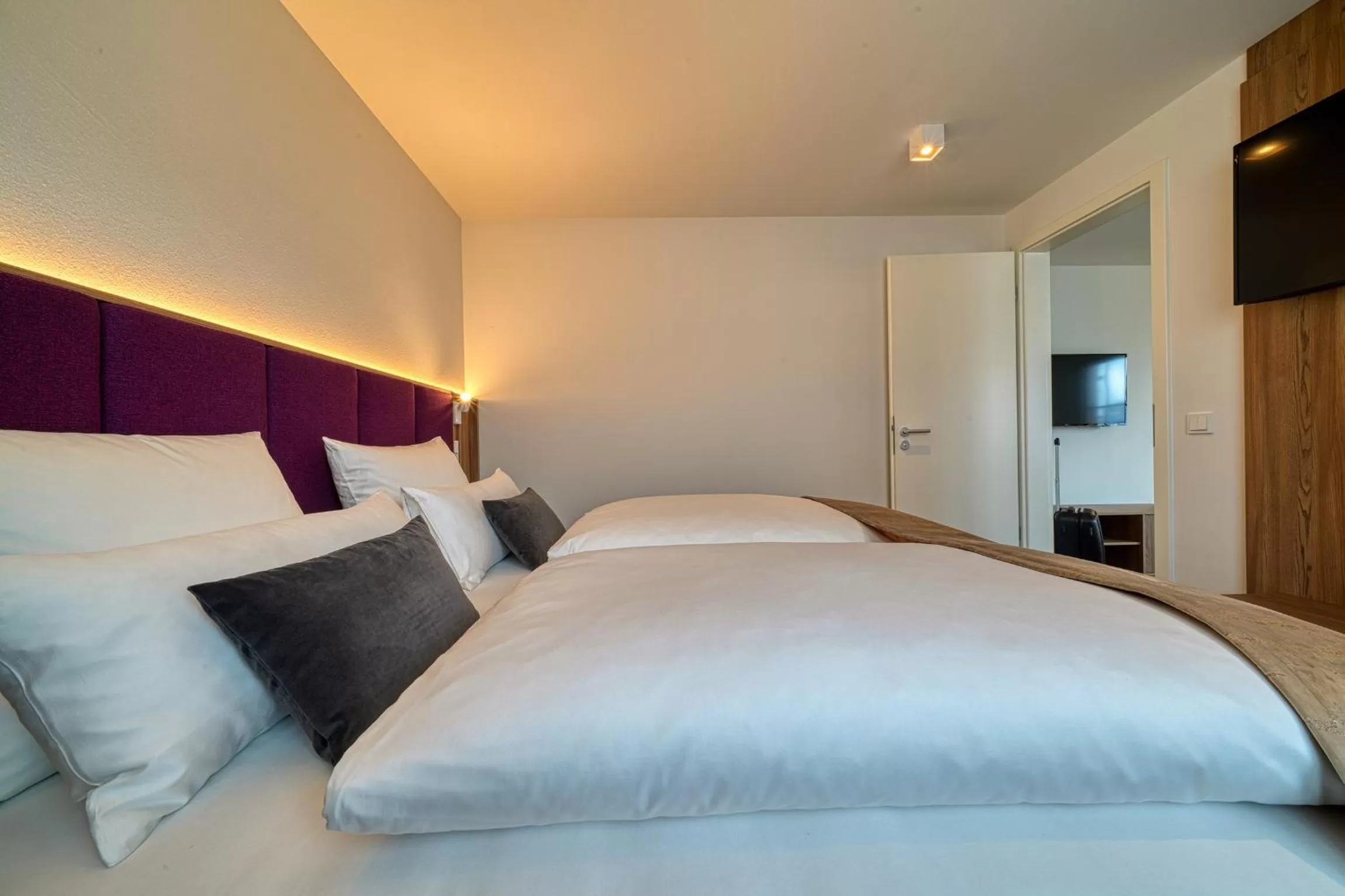 Bed in FourSide Hotel Ringsheim, Trademark Collection by Wyndham