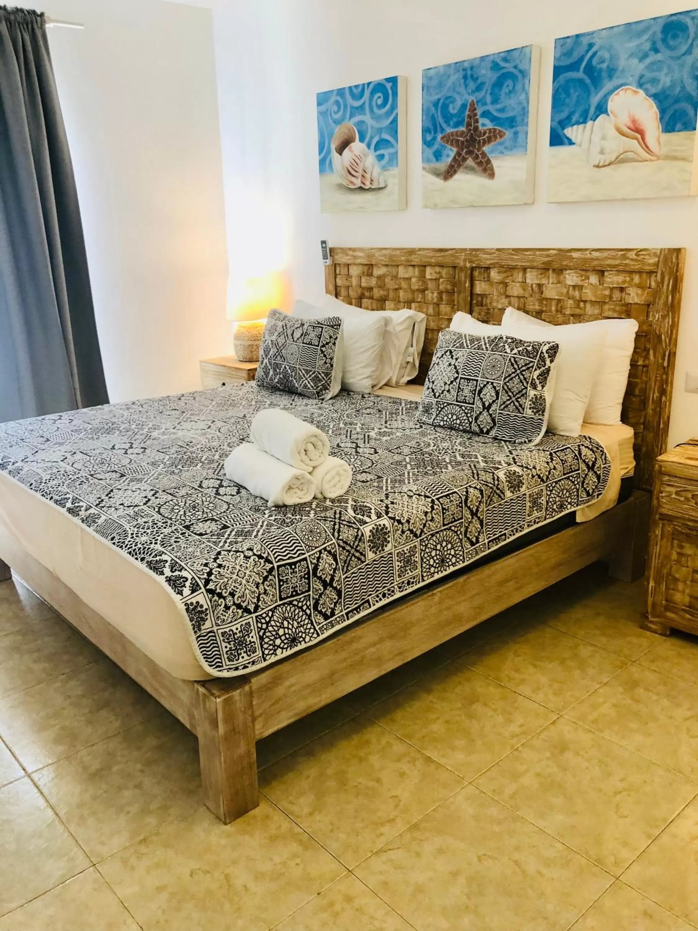 Bed in Los Corales Luxury Villas Beach Club and Spa