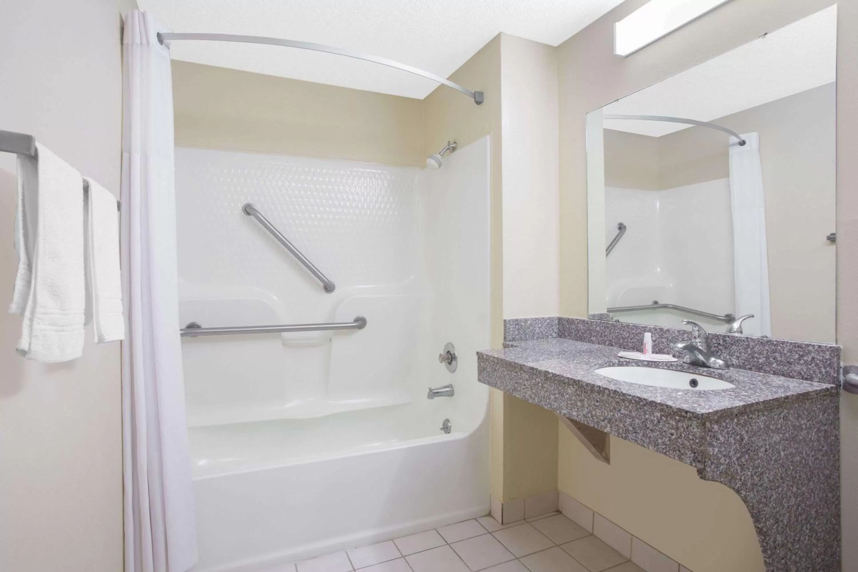 Bathroom in Days Inn by Wyndham Dublin GA