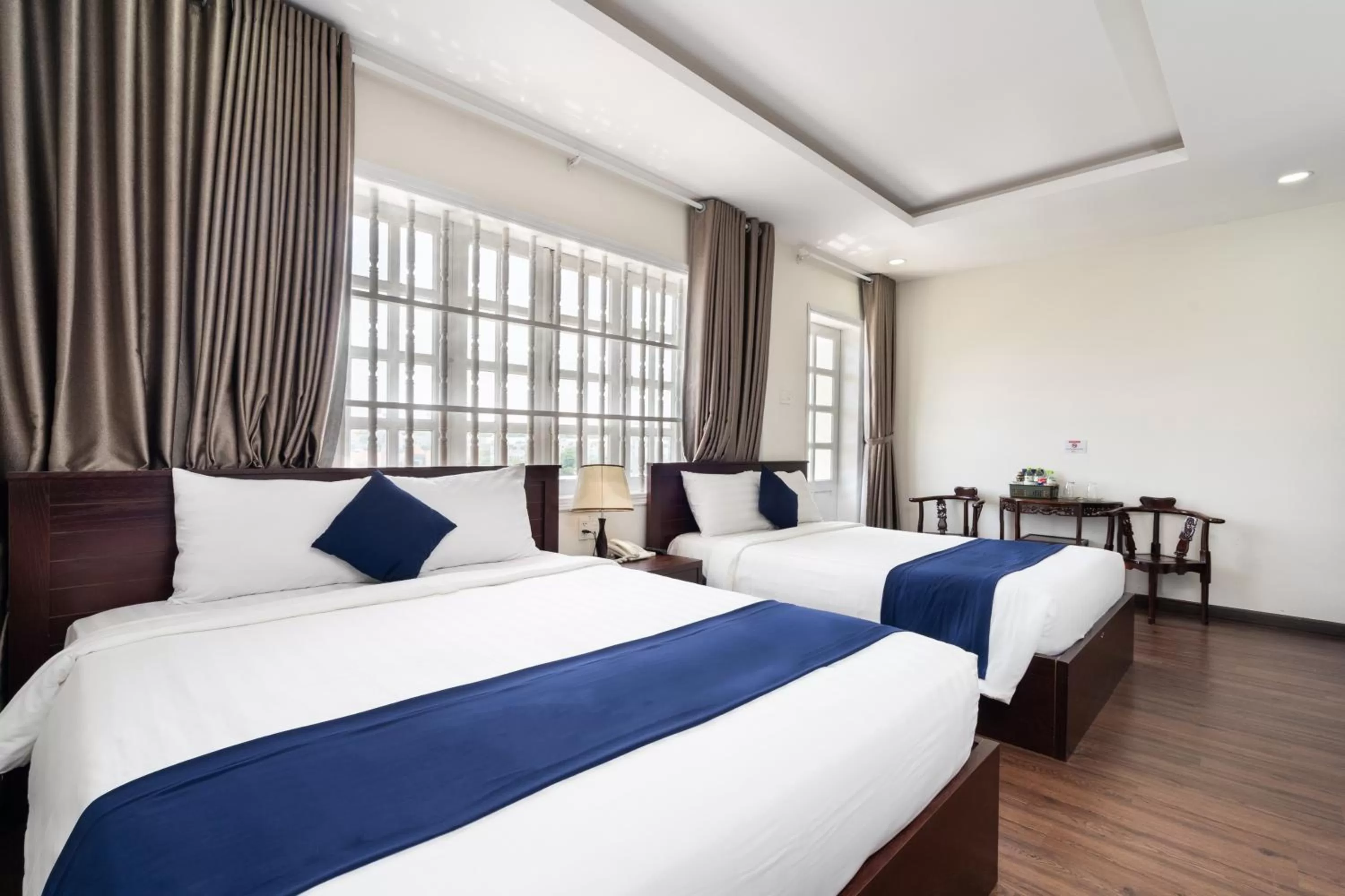 Bed in Central Hotel by Joi Hospitality