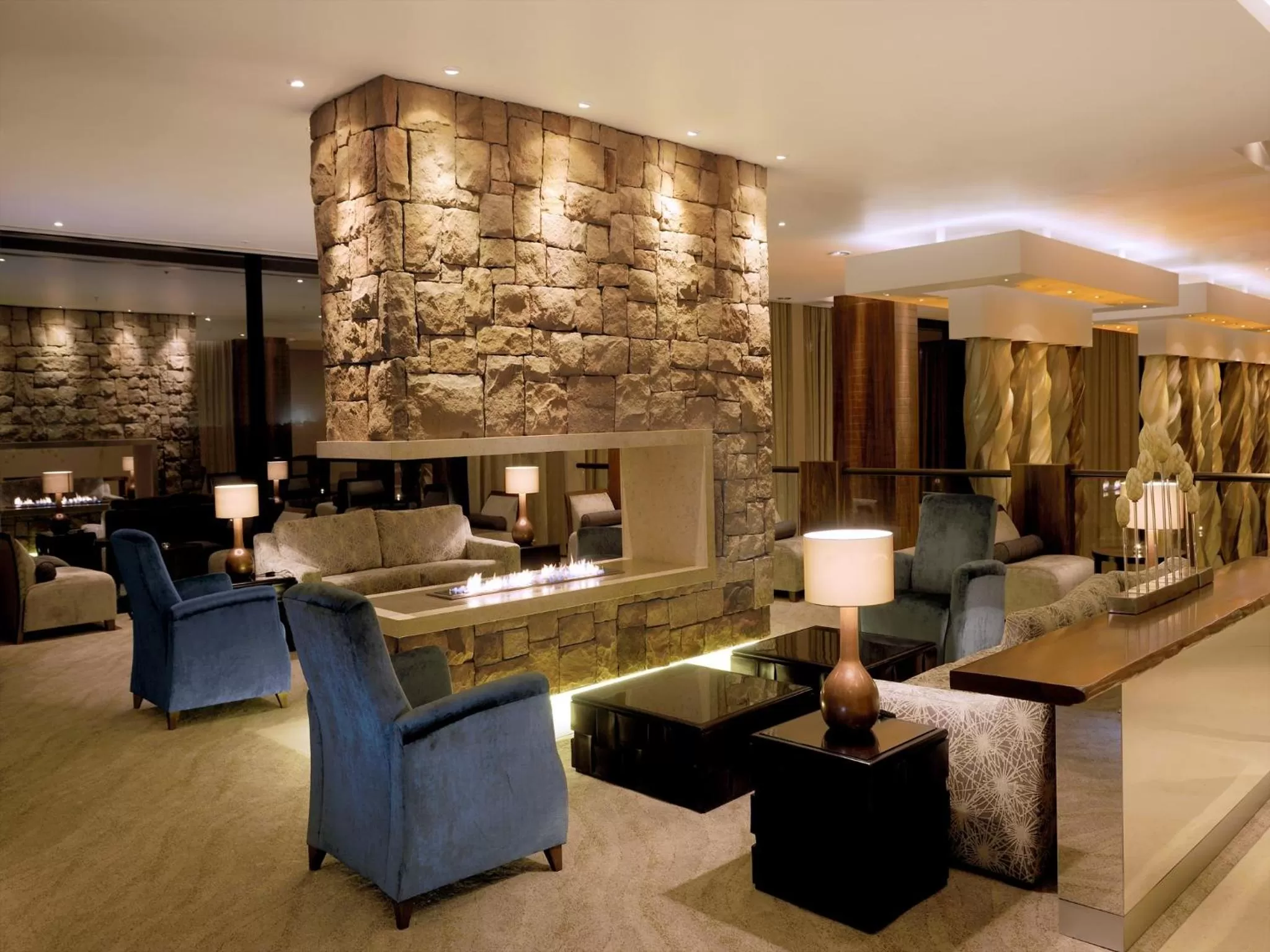 Communal lounge/ TV room in Oubaai Hotel Golf & Spa