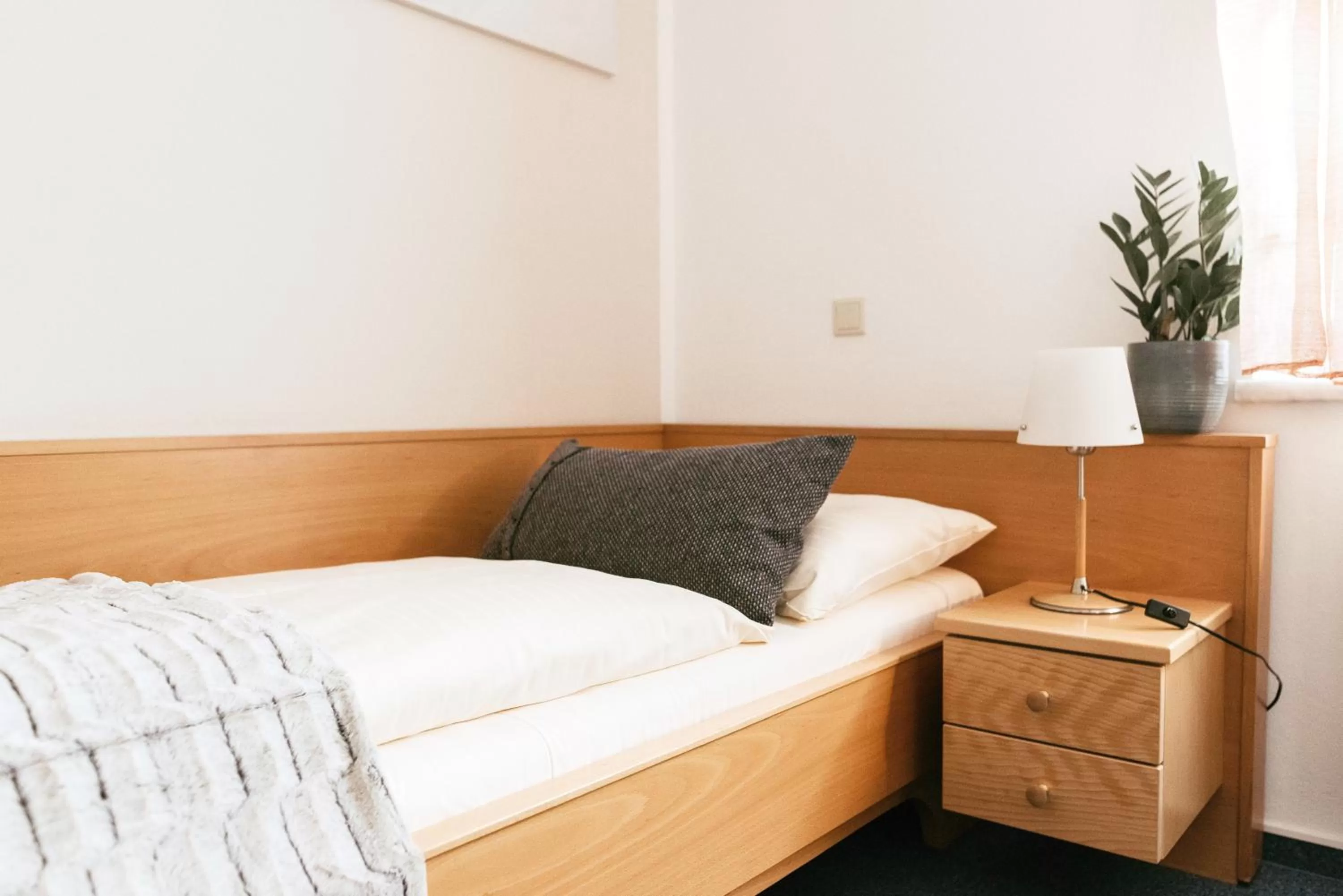 Bed in Restaurant Gästehaus Feldkirchen