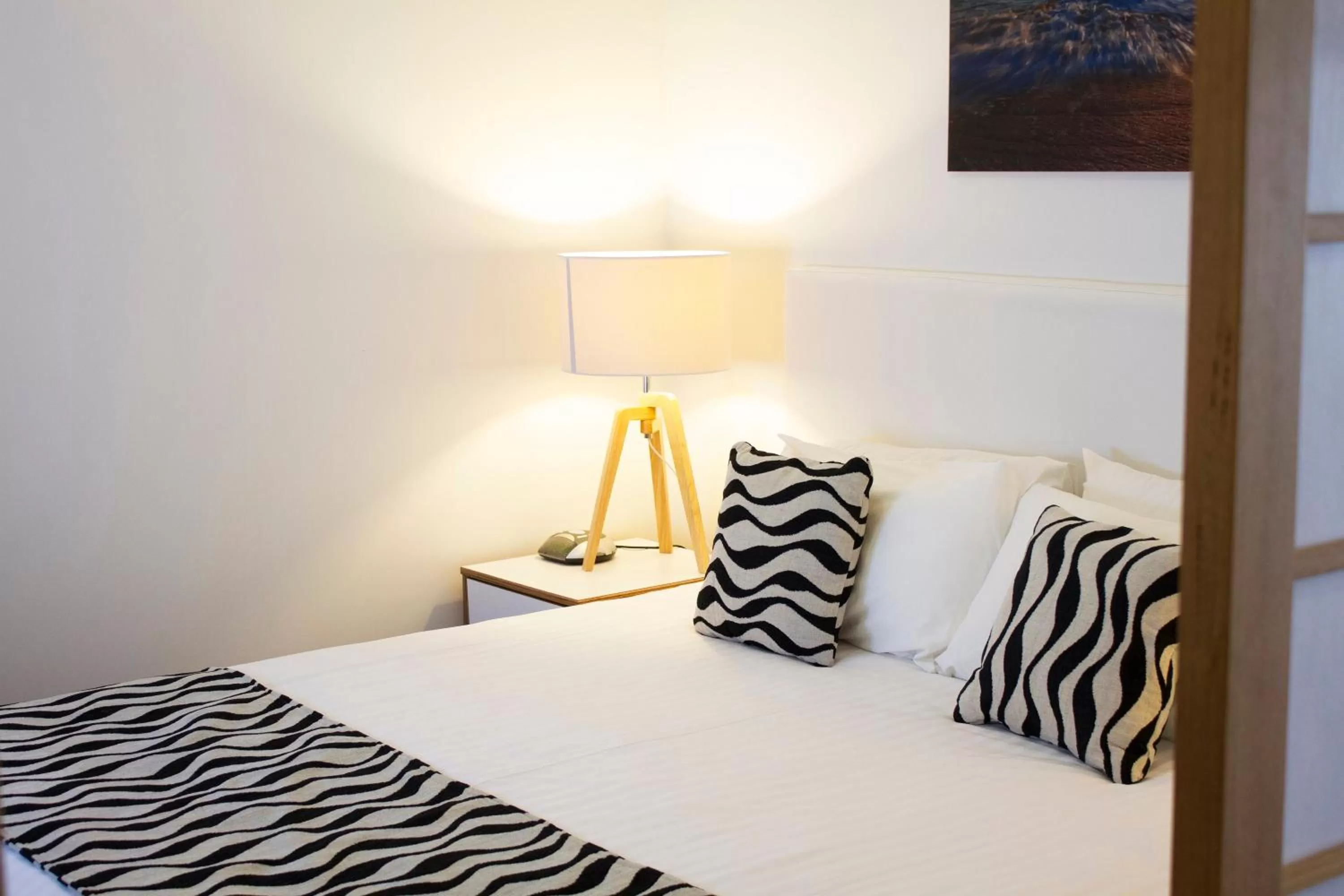 Bed in Ramada Resort by Wyndham Shoal Bay