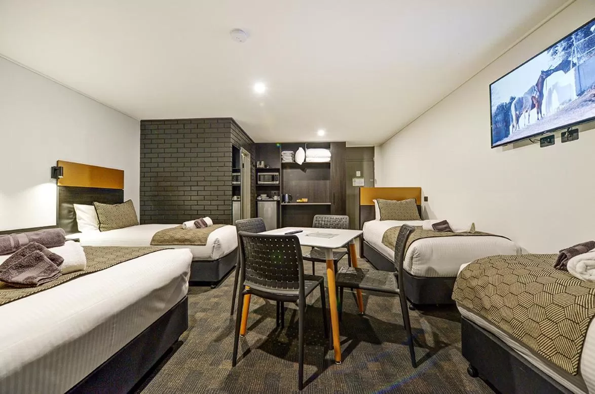 Photo of the whole room, Bed in CBD Motor Inn