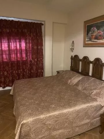 Bedroom in Capri Beach Hotel