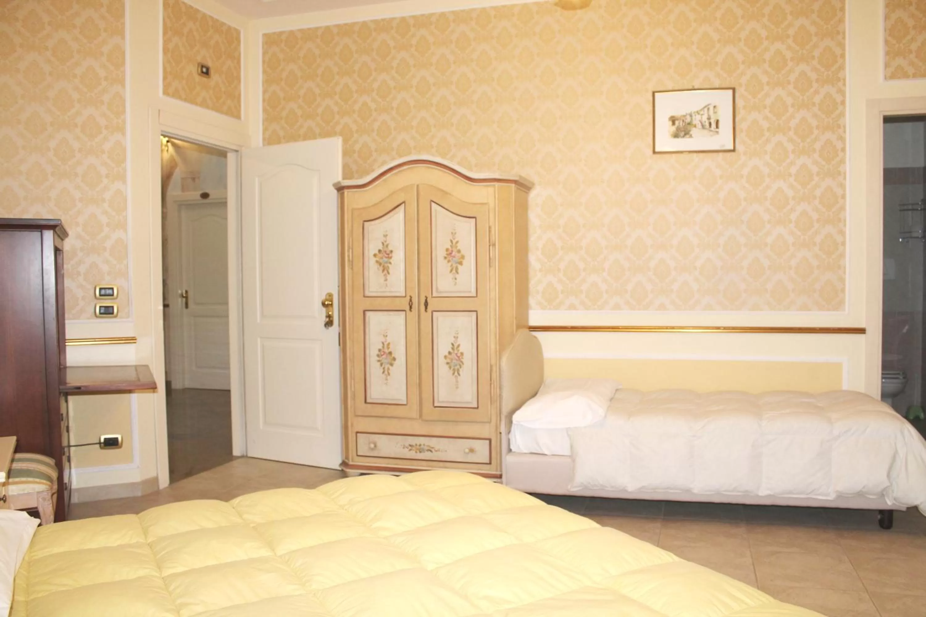 Photo of the whole room, Bed in Hotel Rinascimento