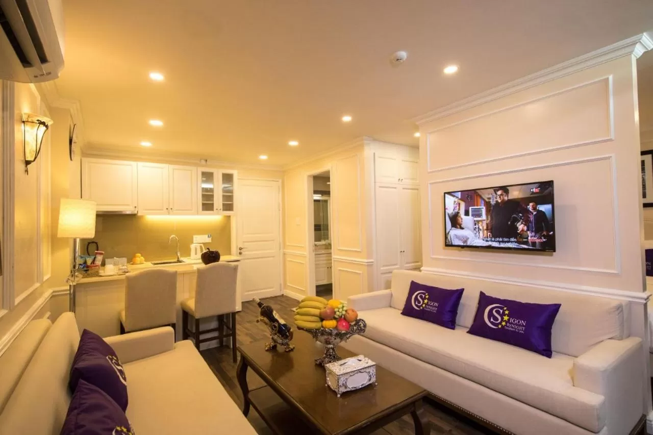 Living room in Saigon By Night Luxury Hotel