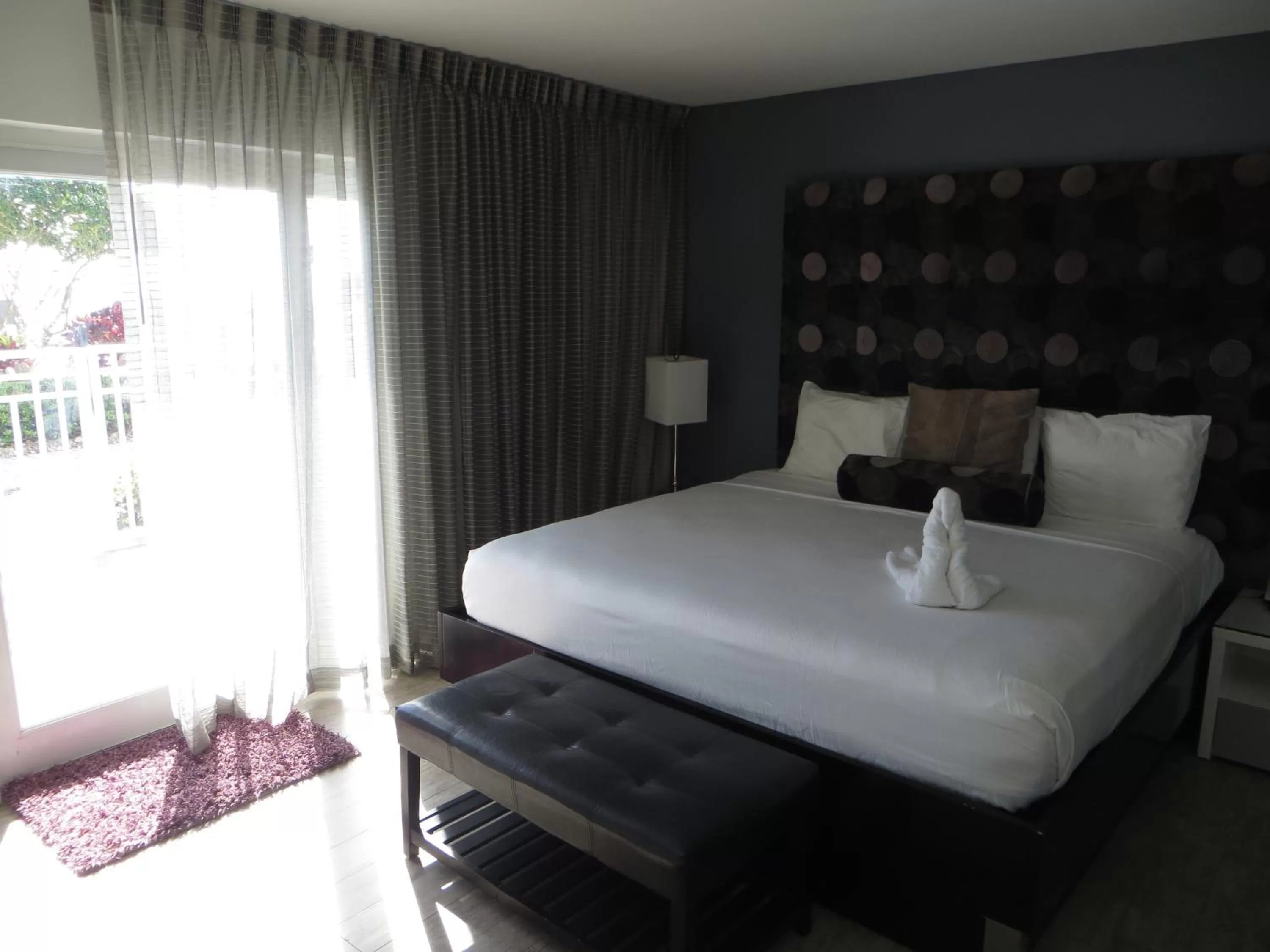 Bed in Lotus Boutique Inn and Suites