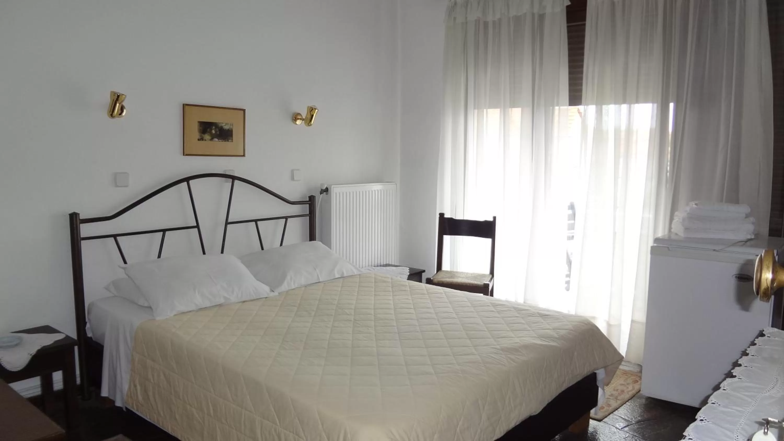 Bed in Acropolis Hotel