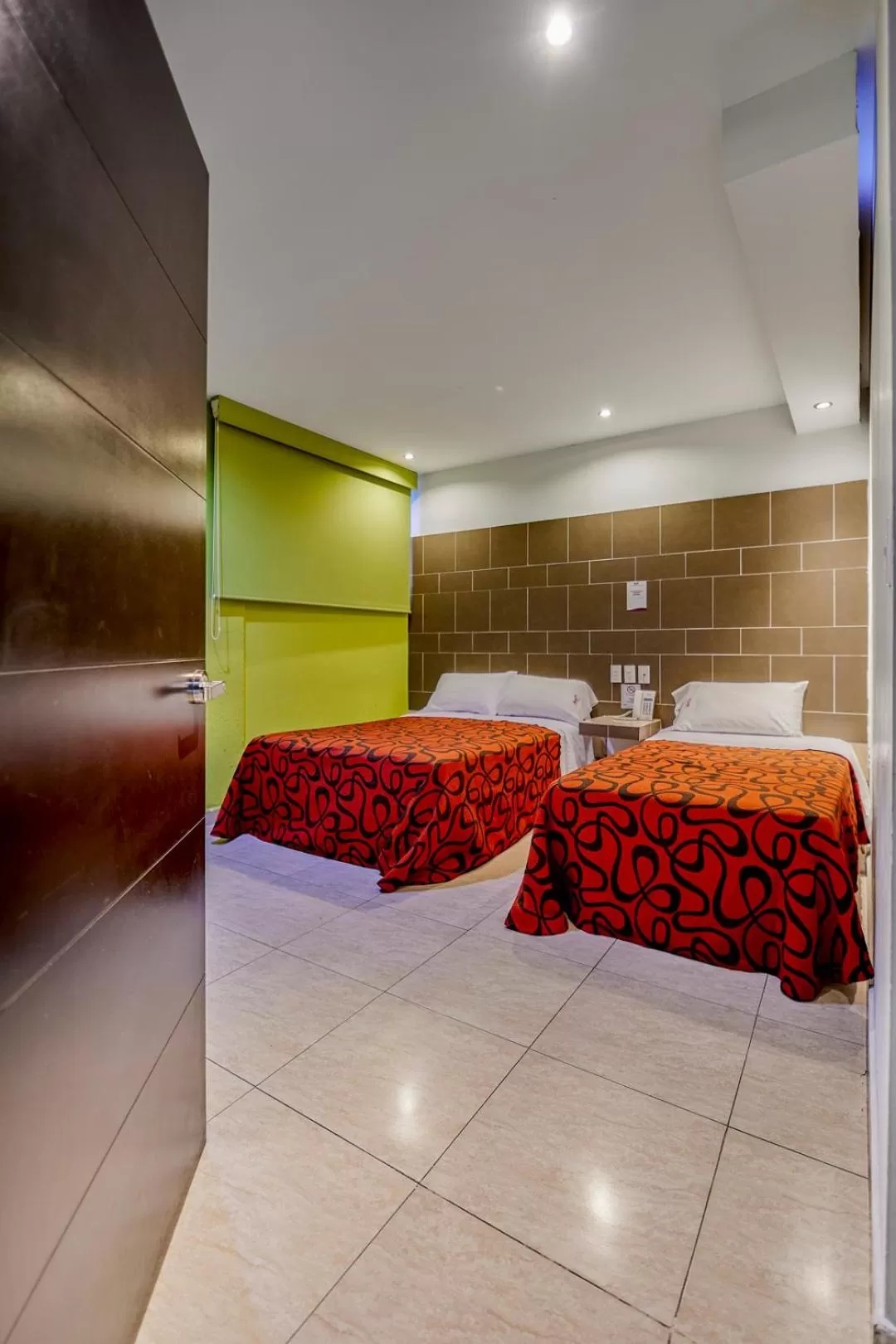 Bed in First Inn Hotel & Business