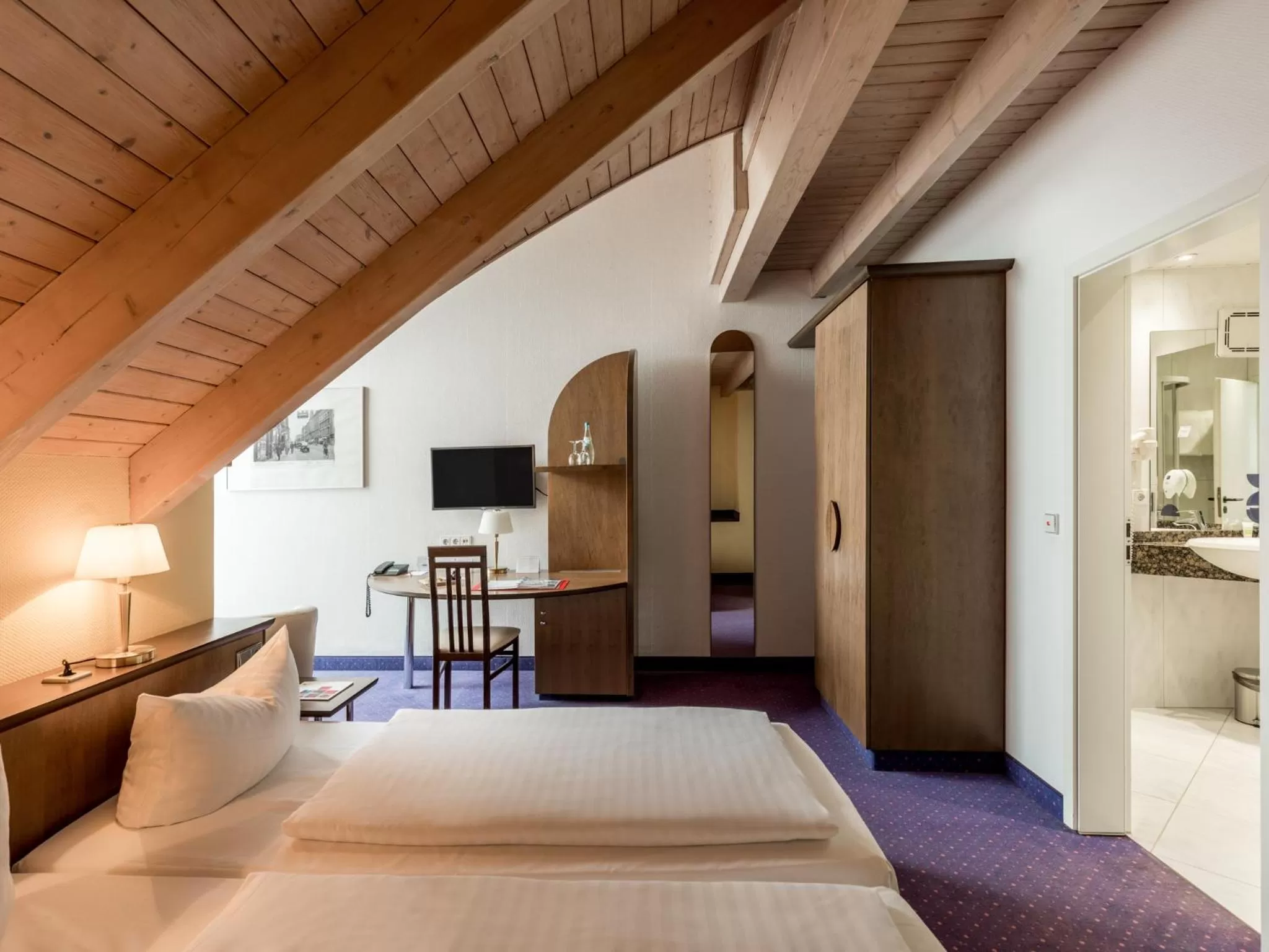 Photo of the whole room, Bed in AZIMUT Hotel Dresden