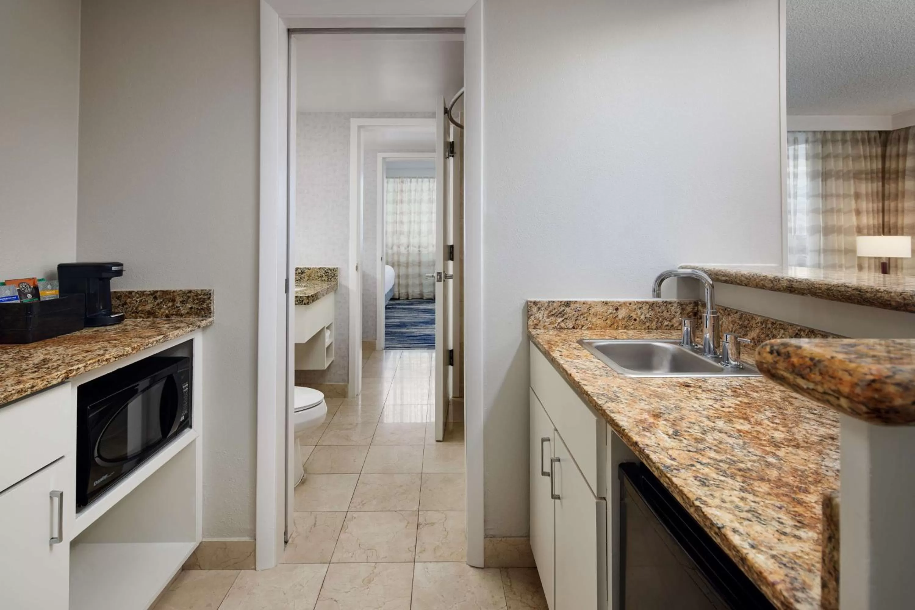Kitchen or kitchenette in Embassy Suites by Hilton West Palm Beach Central