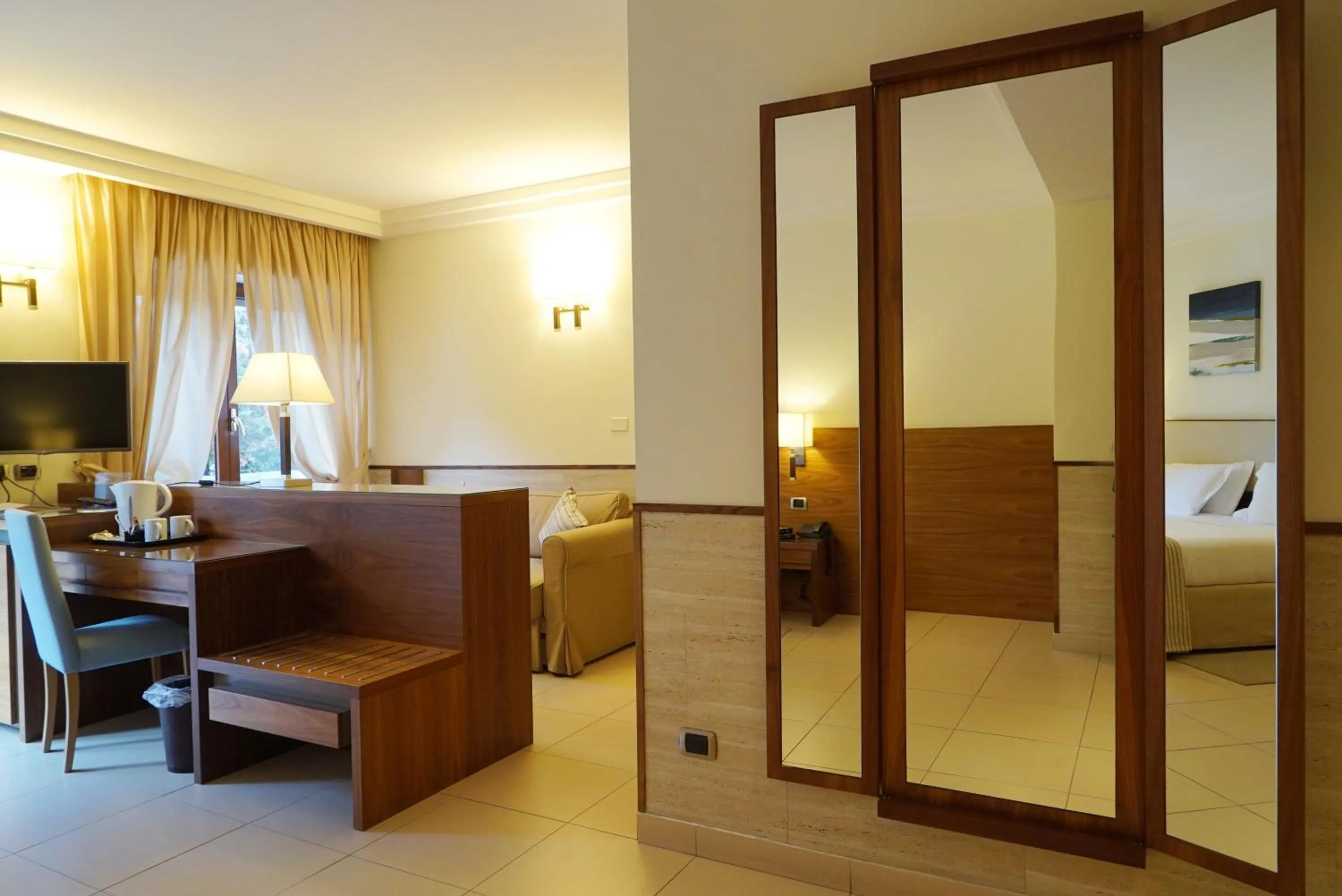 Bed in Suites & Residence Hotel