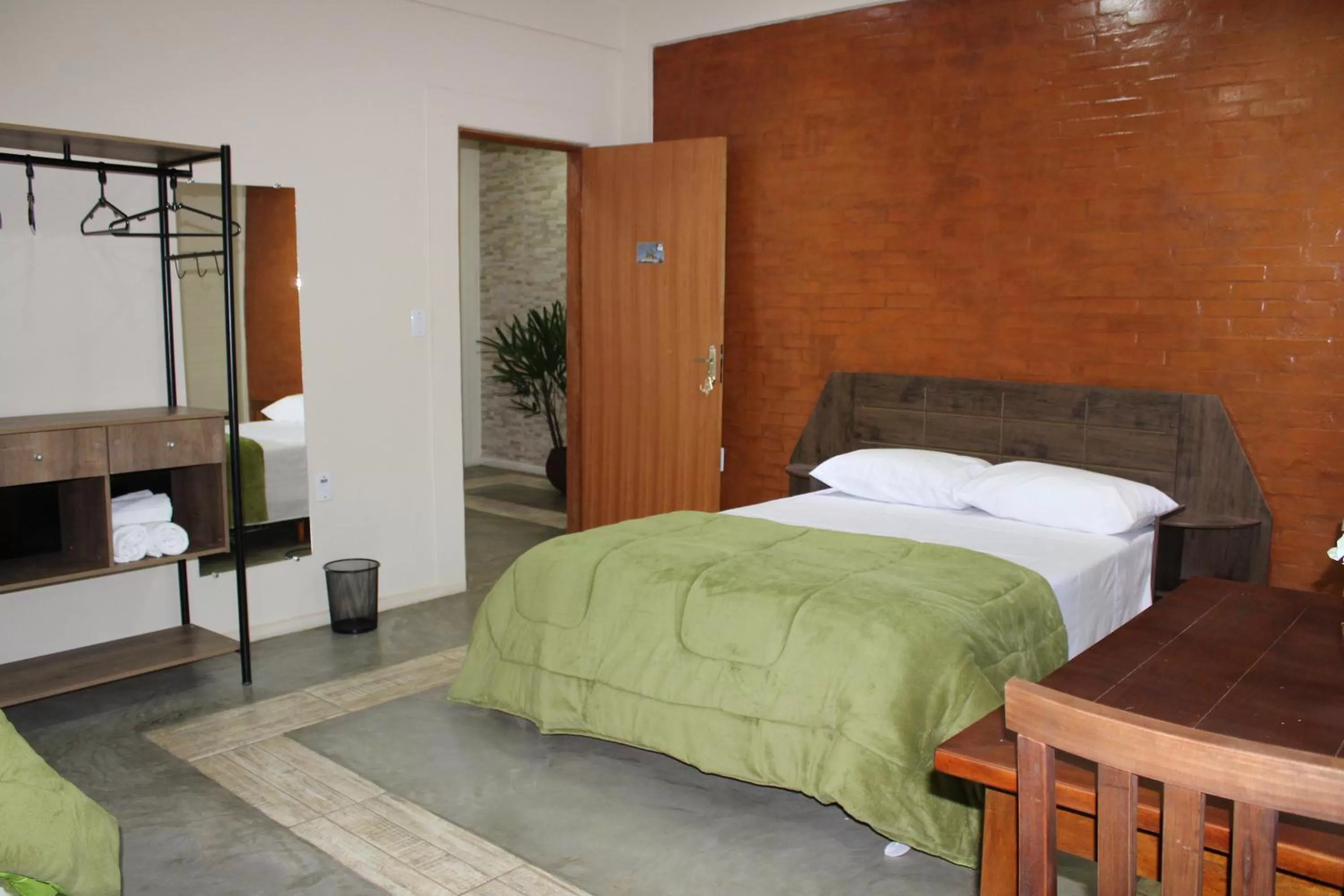 Bed in Pousada Morro dos Ventos