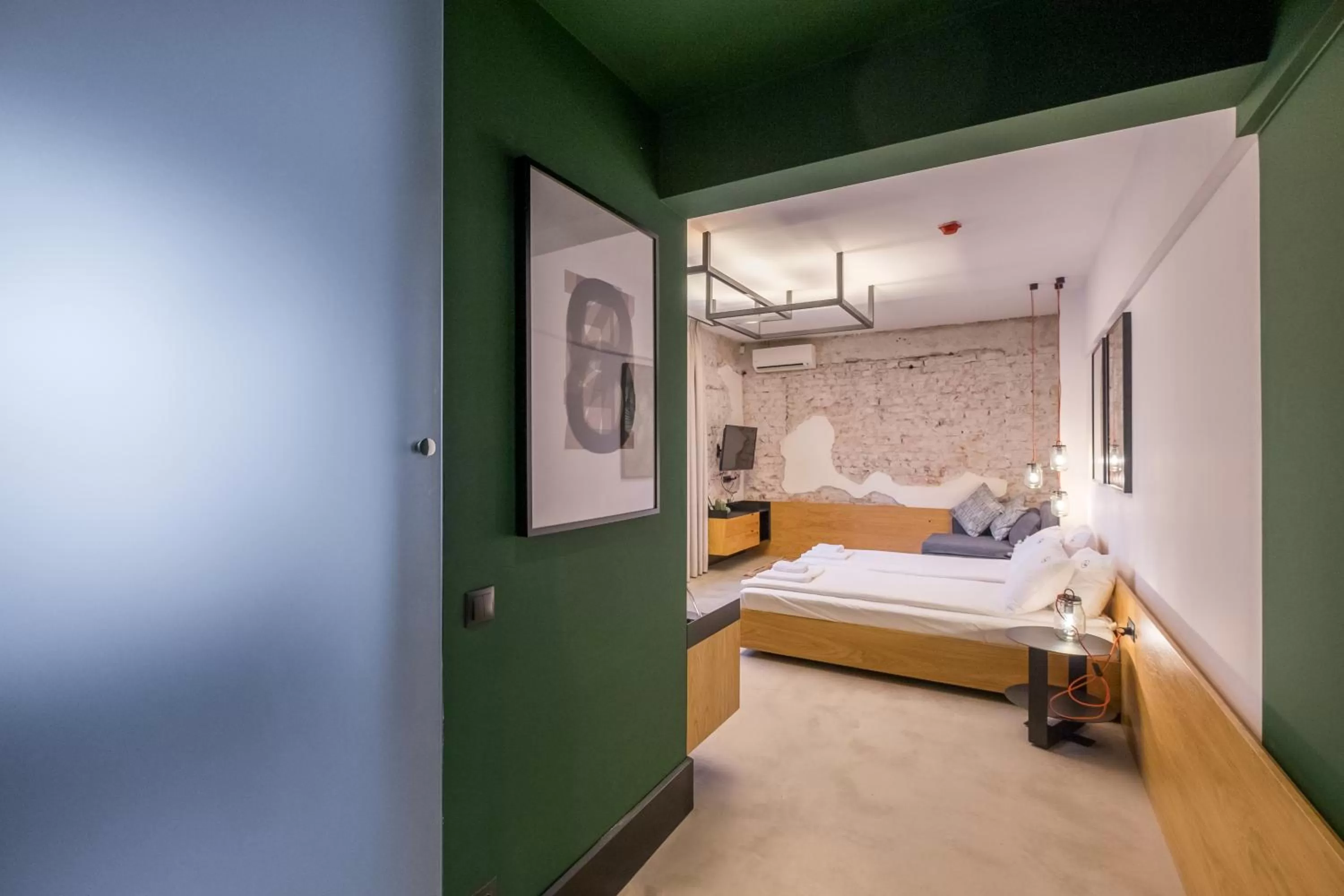 Bed in R34 Boutique Hotel