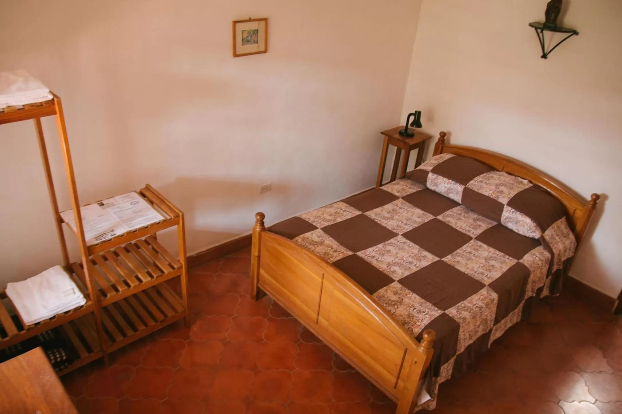 Bed in La Casa de Cafe Bed and Breakfast