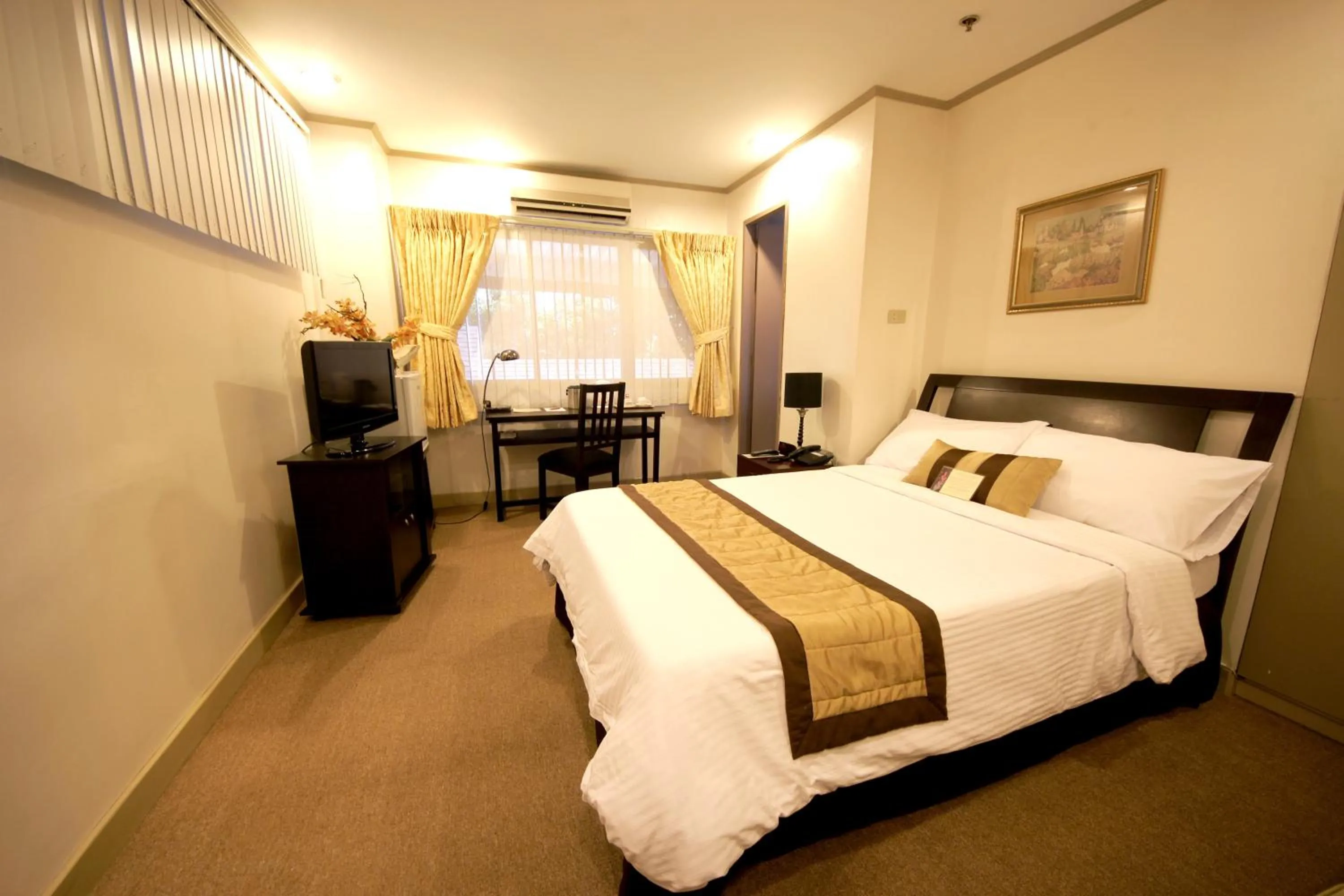 TV and multimedia, Bed in Casa Pura Inn and Suites