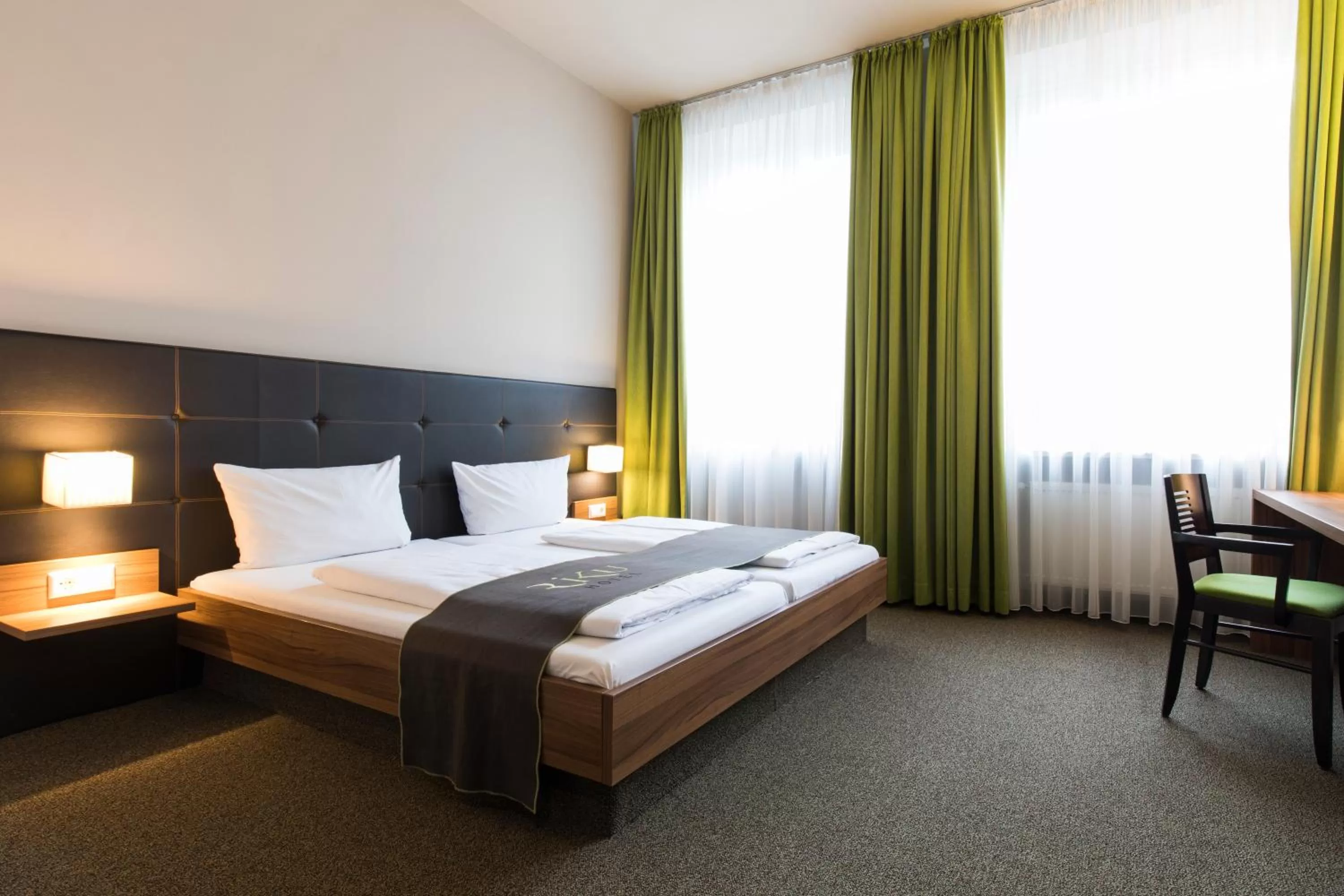 Photo of the whole room, Bed in RiKu HOTEL Neu-Ulm