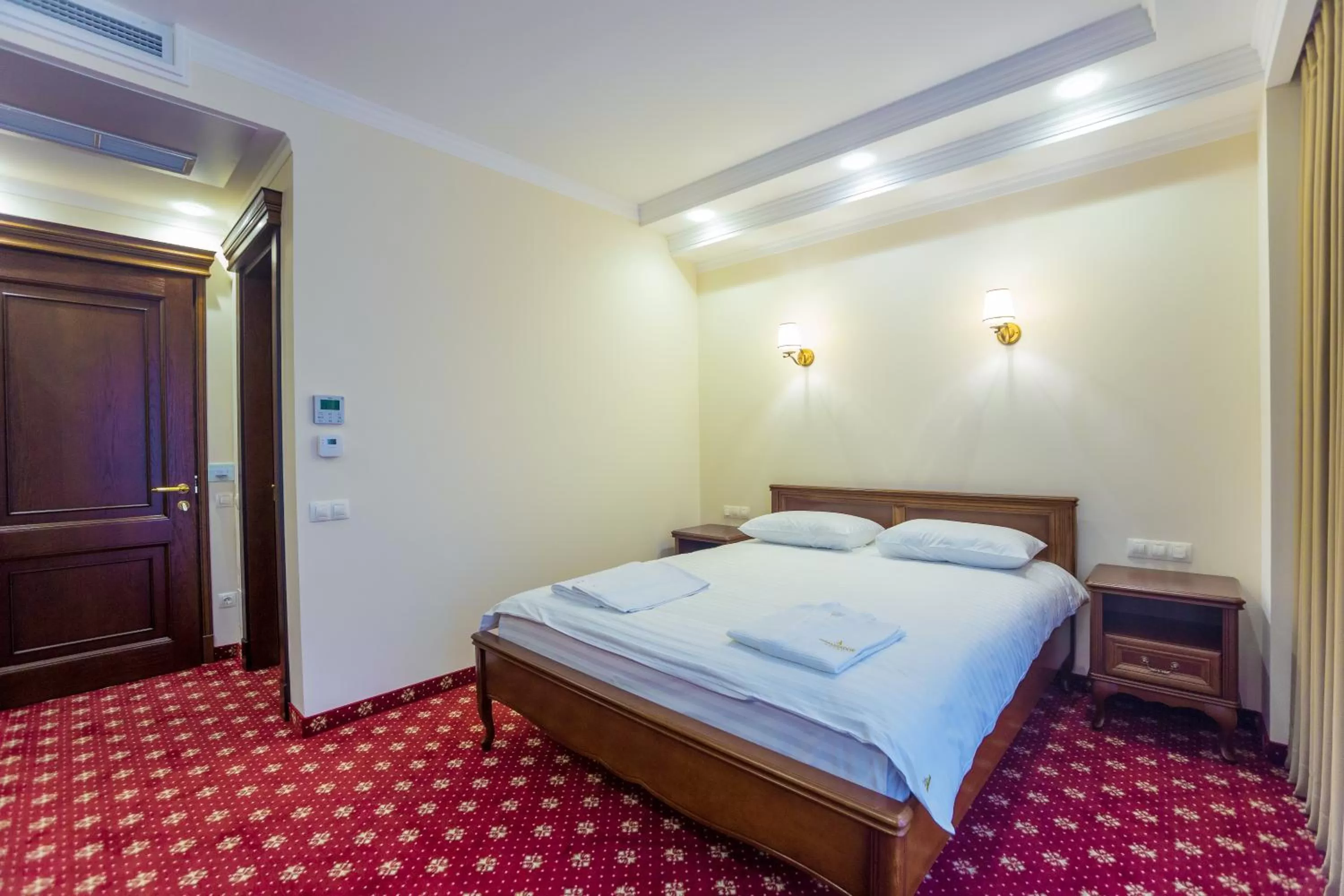 Photo of the whole room, Bed in Ambassador Hotel