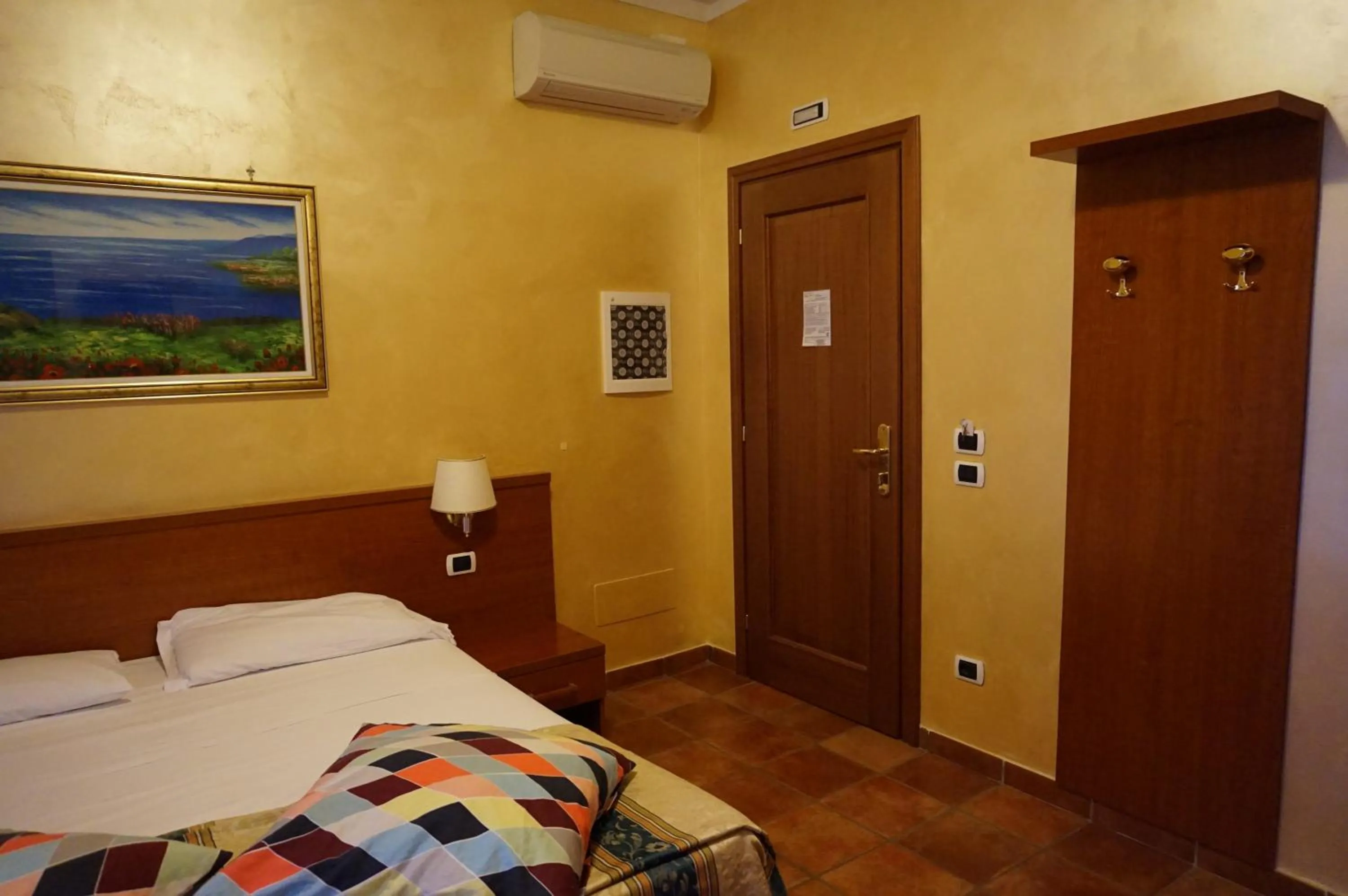 Bed in Hotel Maryelen