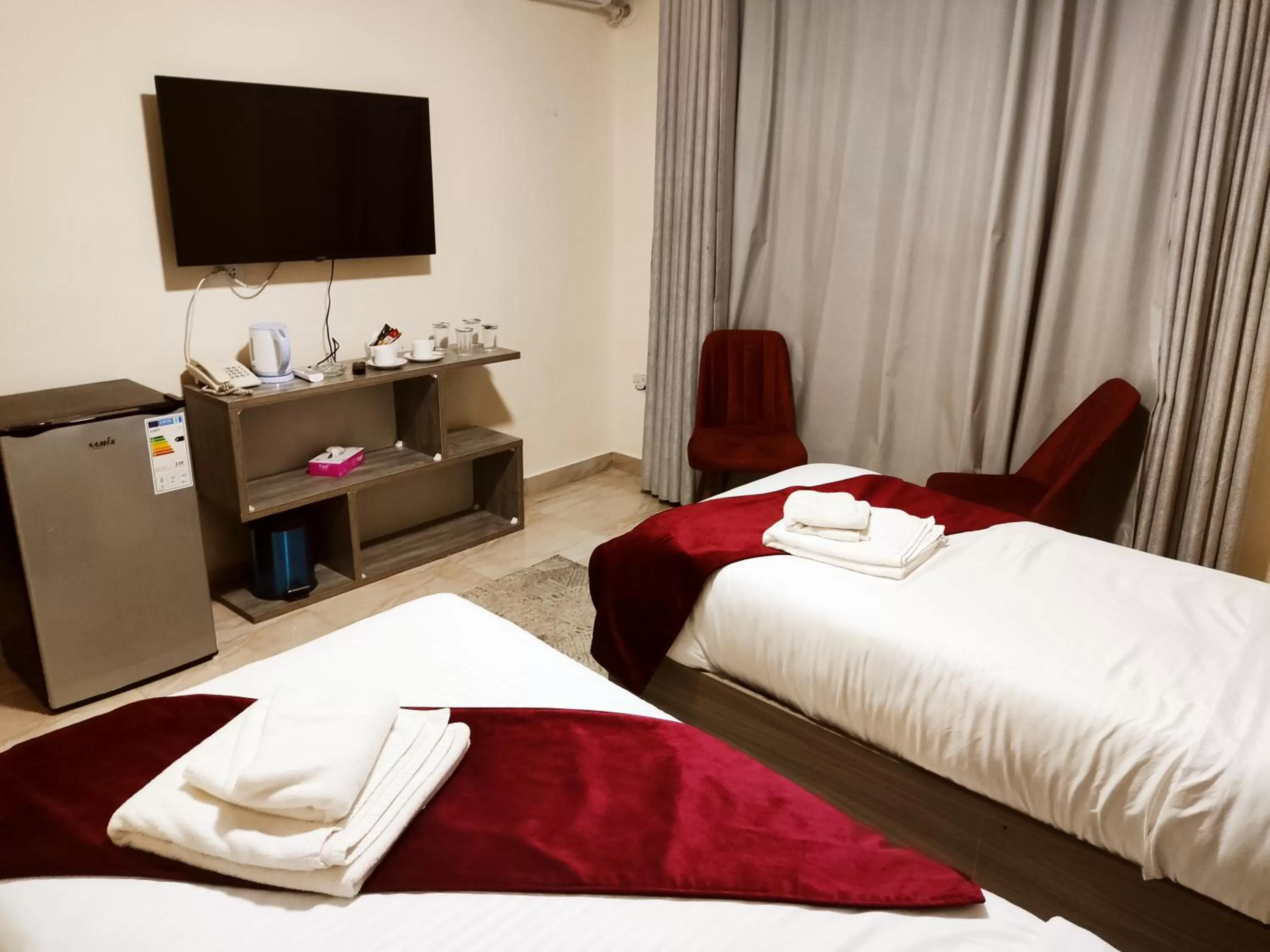 Bed in Golden Plaza Hotel