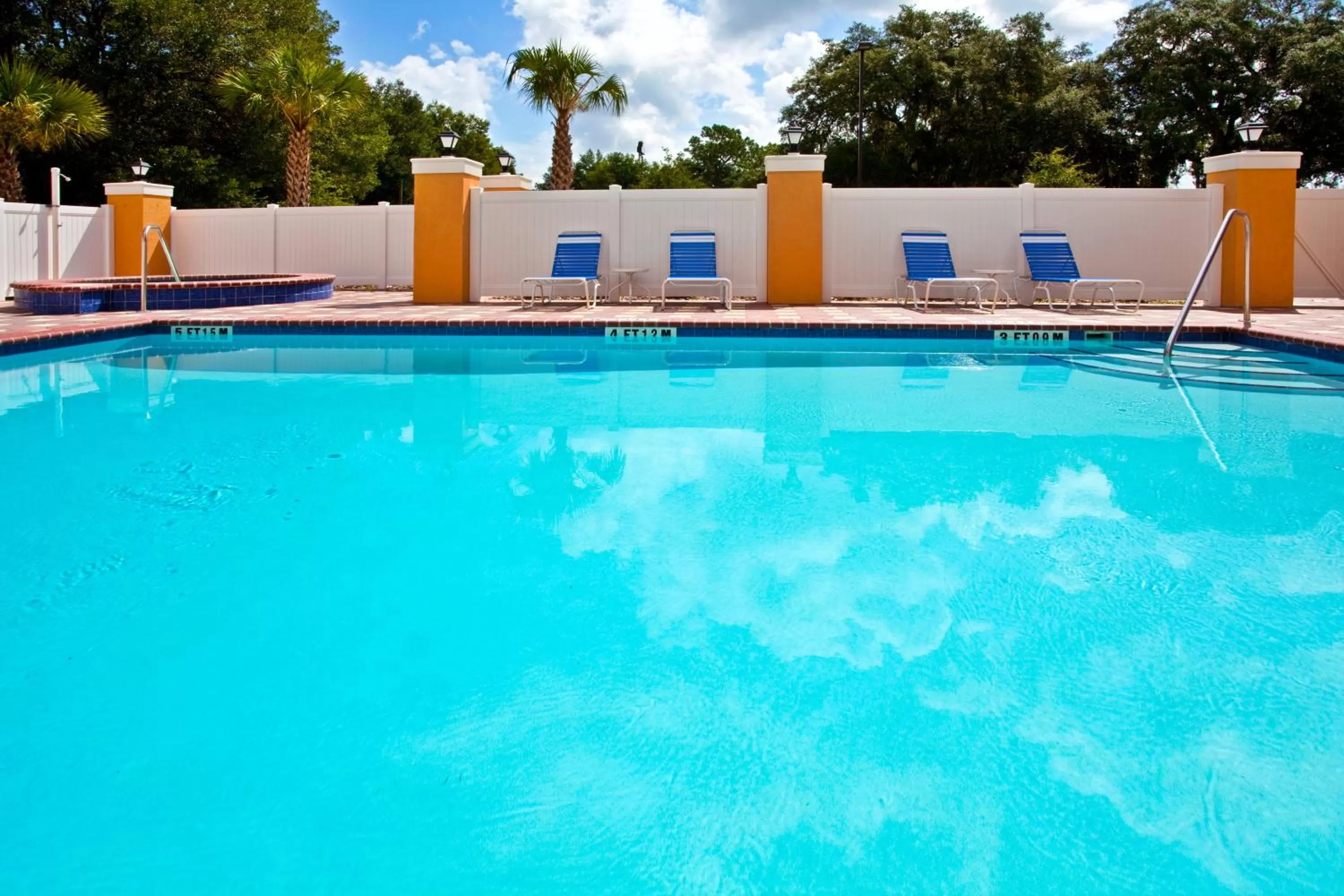 Swimming pool in Holiday Inn Express Hotel & Suites Brooksville-I-75 by IHG
