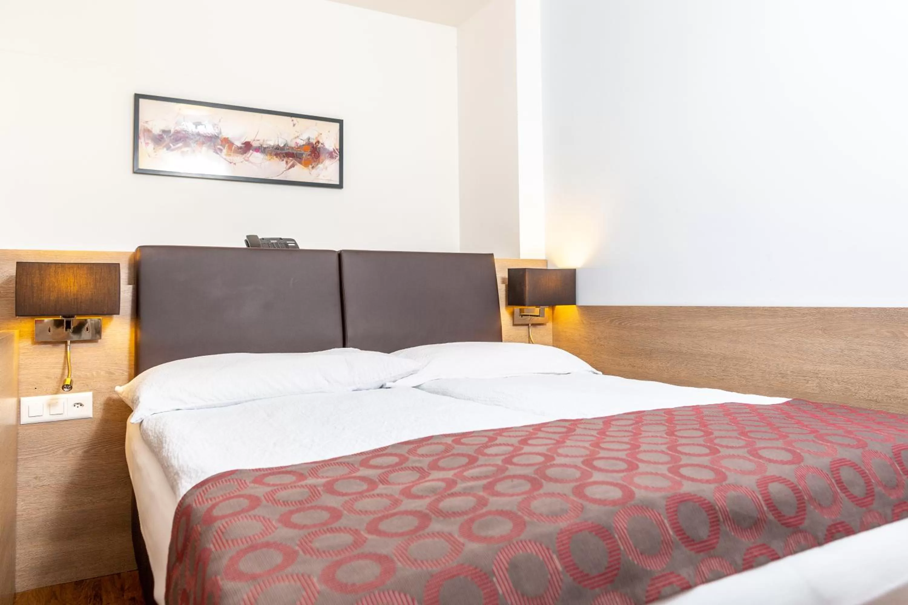 Bed in Hotel Alexander