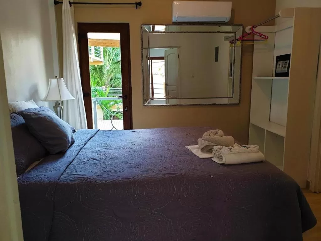 Bed in Beach Side Condos Caye Caulker by CCVH