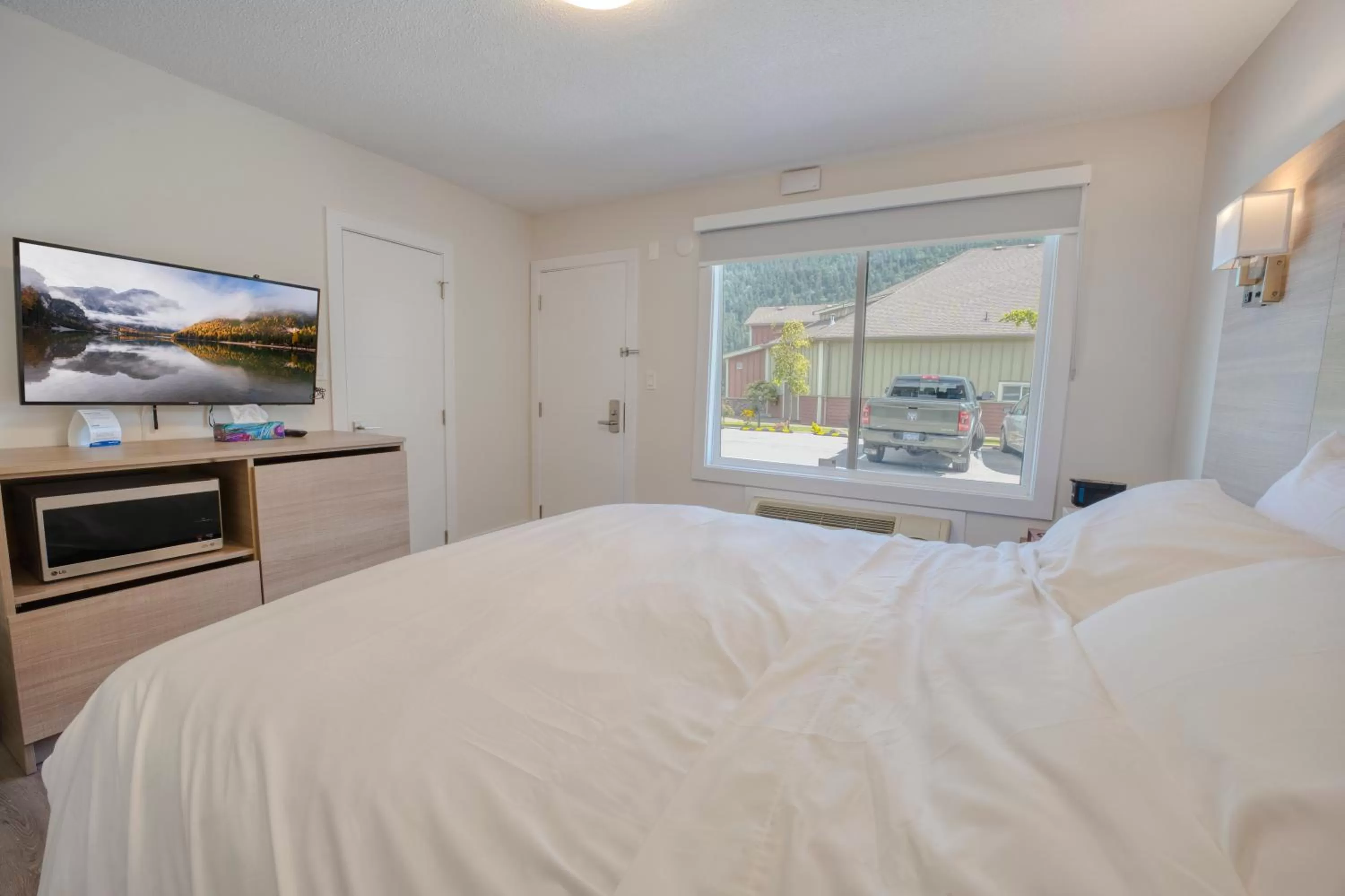 Bed in Harrison Grand Motel