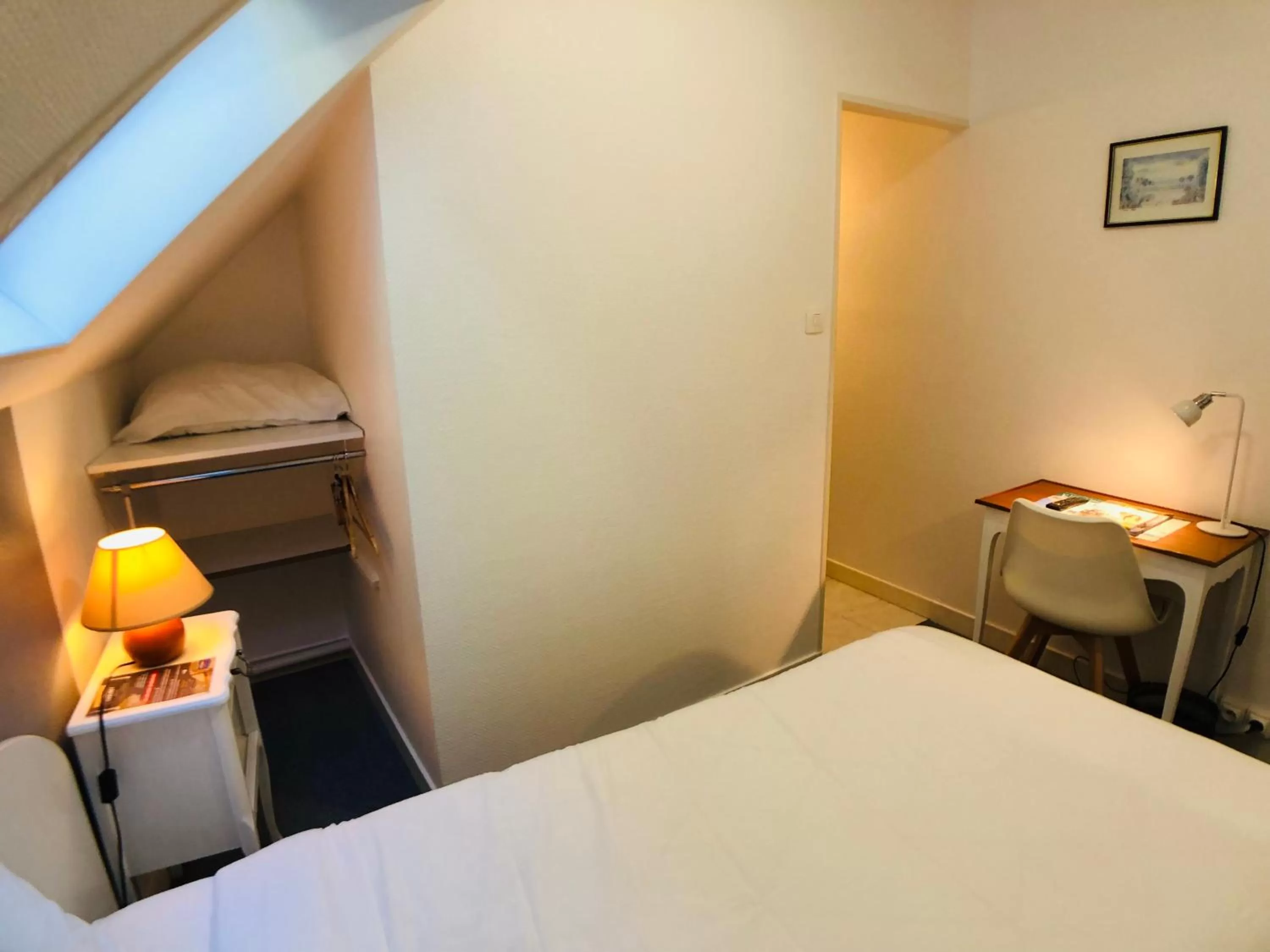 Bed in Cit'Hotel Le Volney