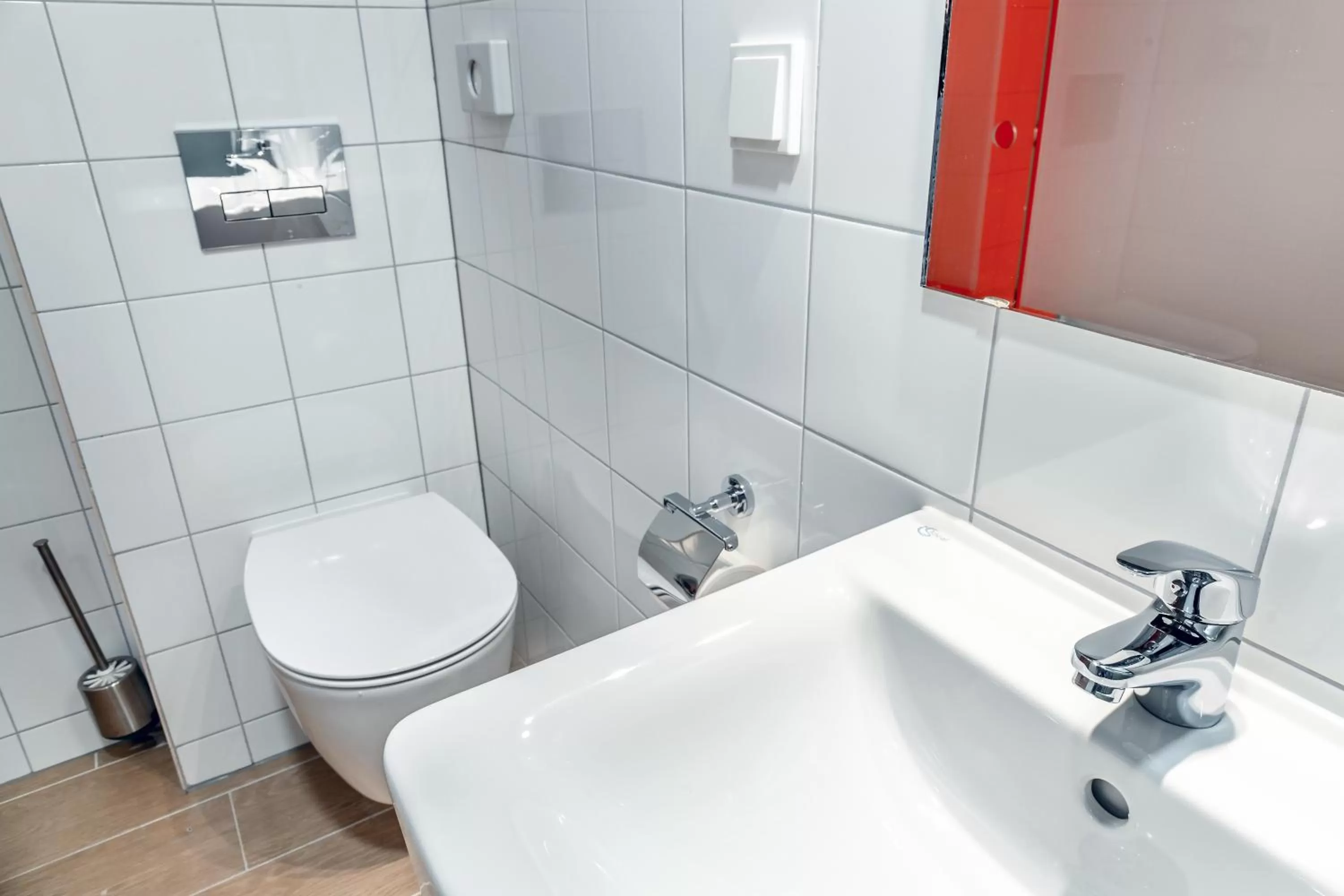 Toilet in Augustus Hotel Bernkastel - Comfortable Budget Hotel