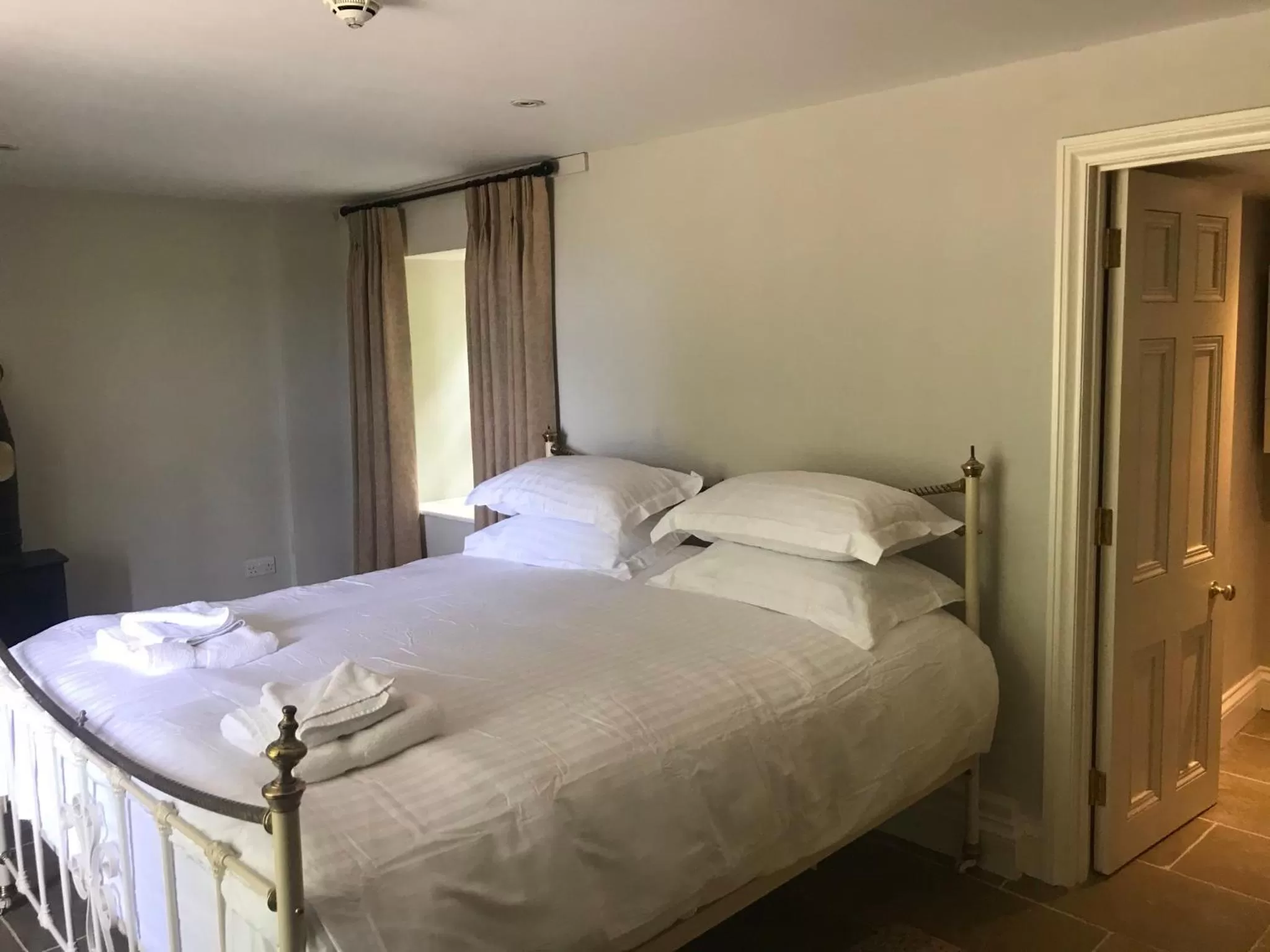 Bed in The Farmhouse at Bodnant Welsh Food