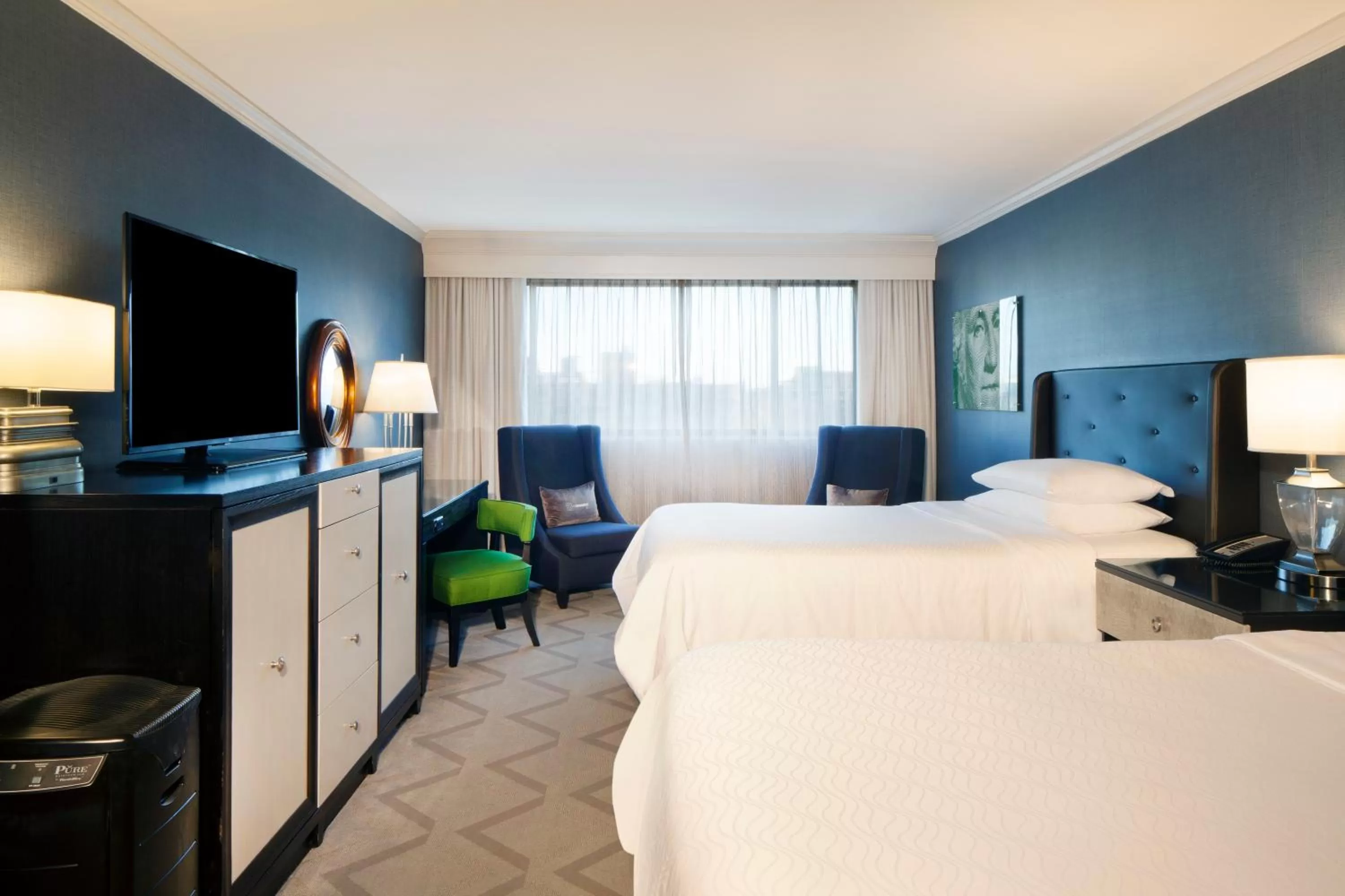 Bed in Melrose Georgetown Hotel