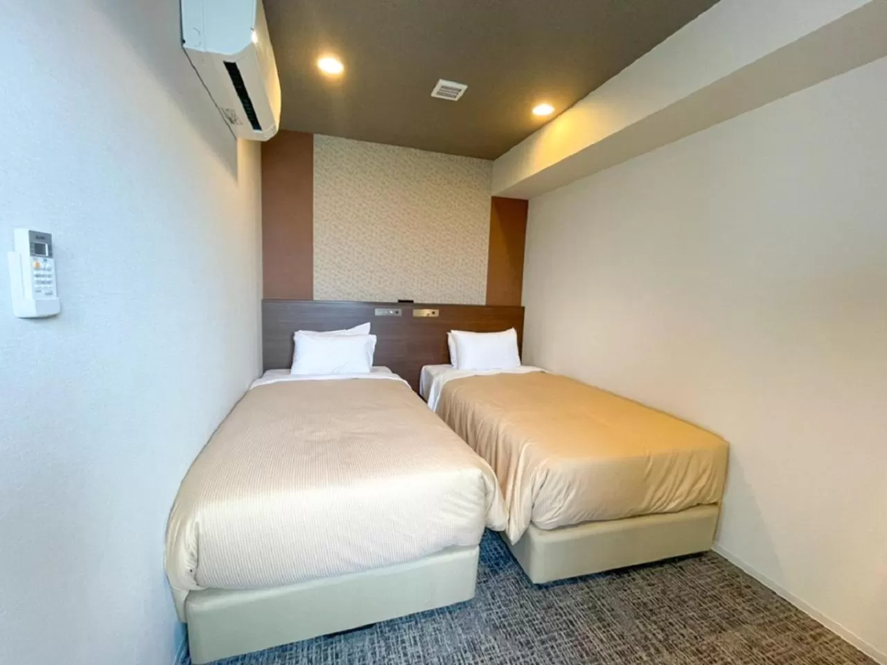 Bed in HOTEL LiVEMAX BUDGET Nagoya Shinkansen-guchi