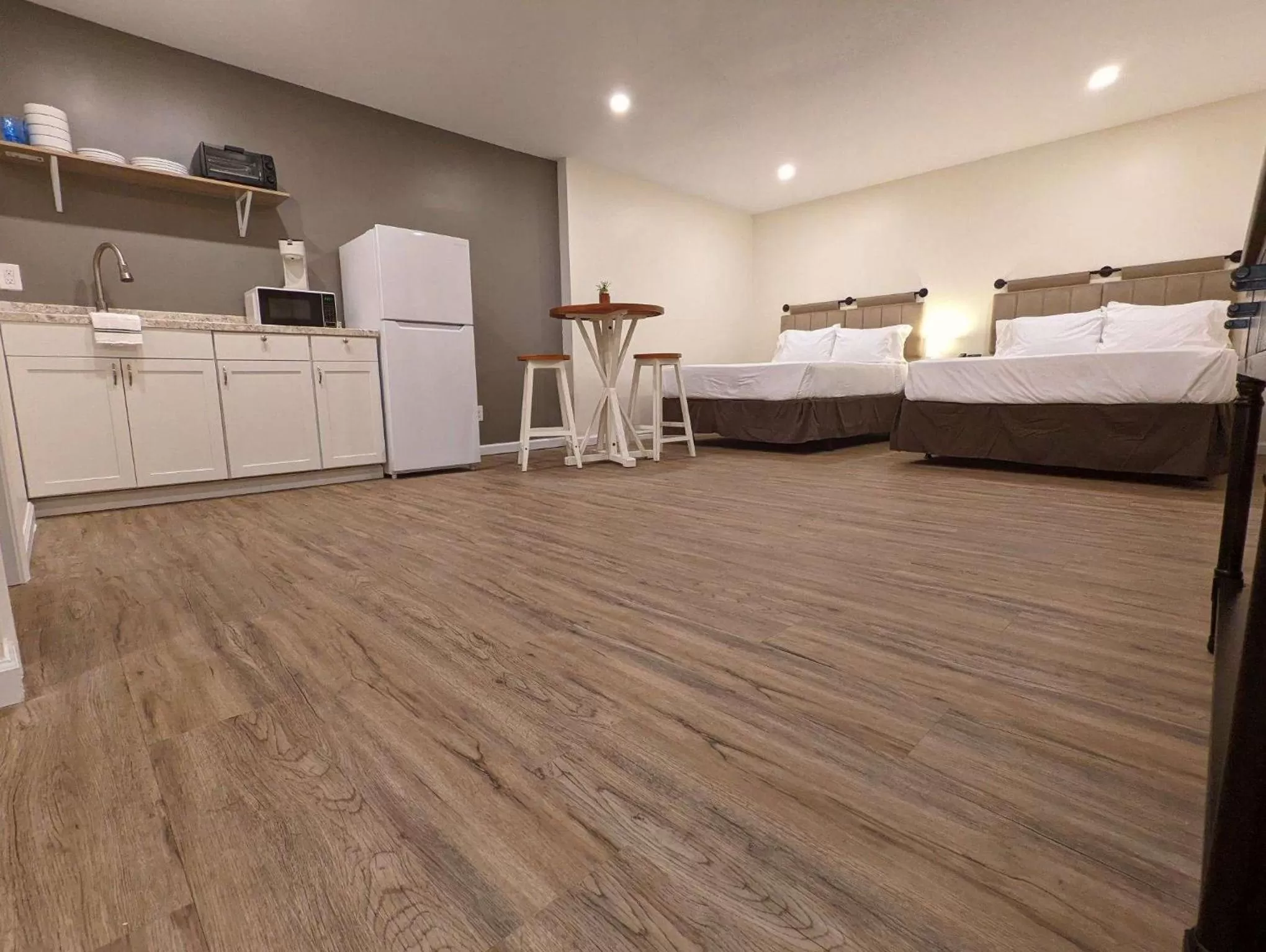 Bed in The Honey Bee Motel