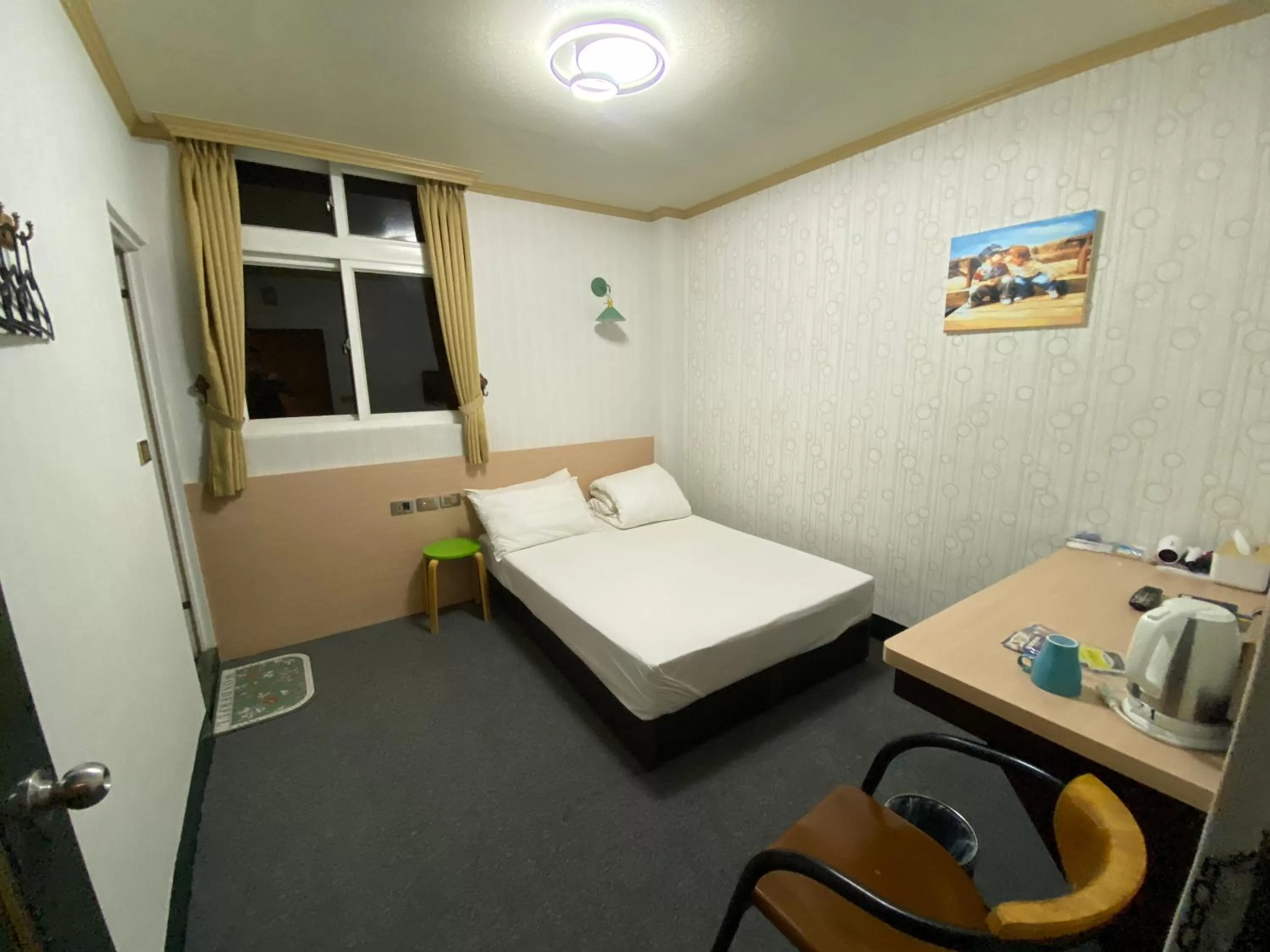 Photo of the whole room, Bed in Rich Zone Hotel