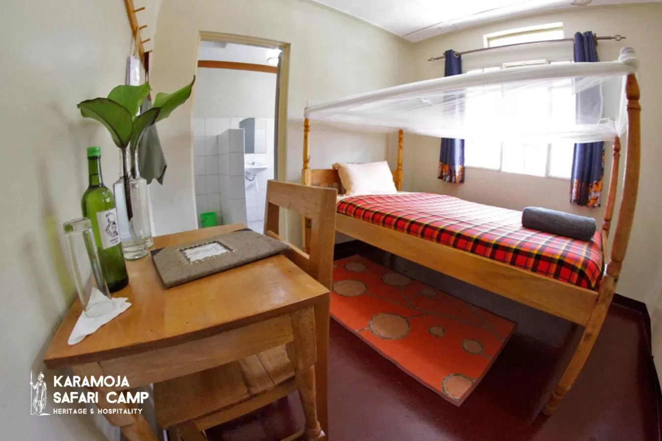 Bed in Kara-Tunga Safari Camp