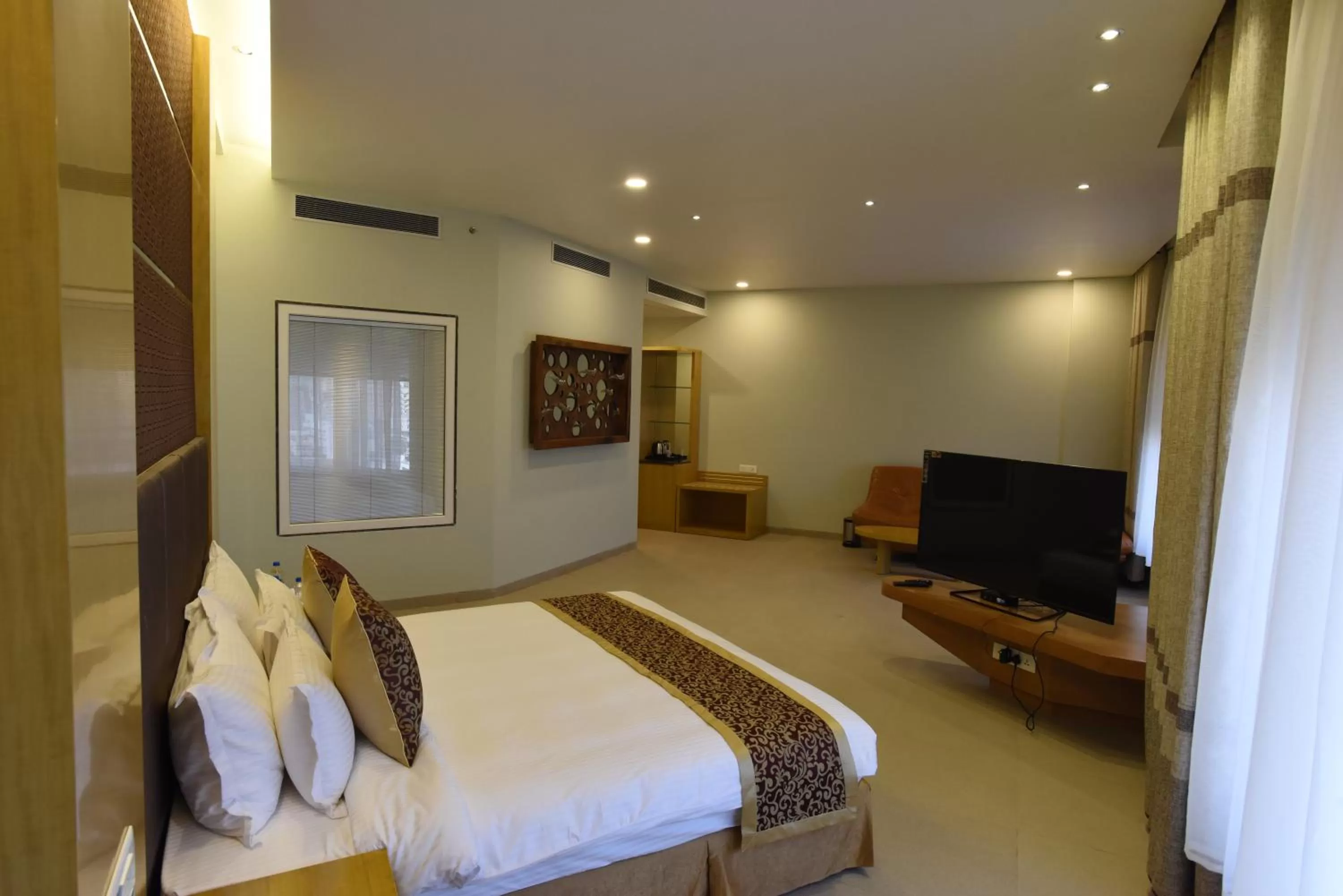 Bed in Hotel H - Sandhill Hotels Private Limited