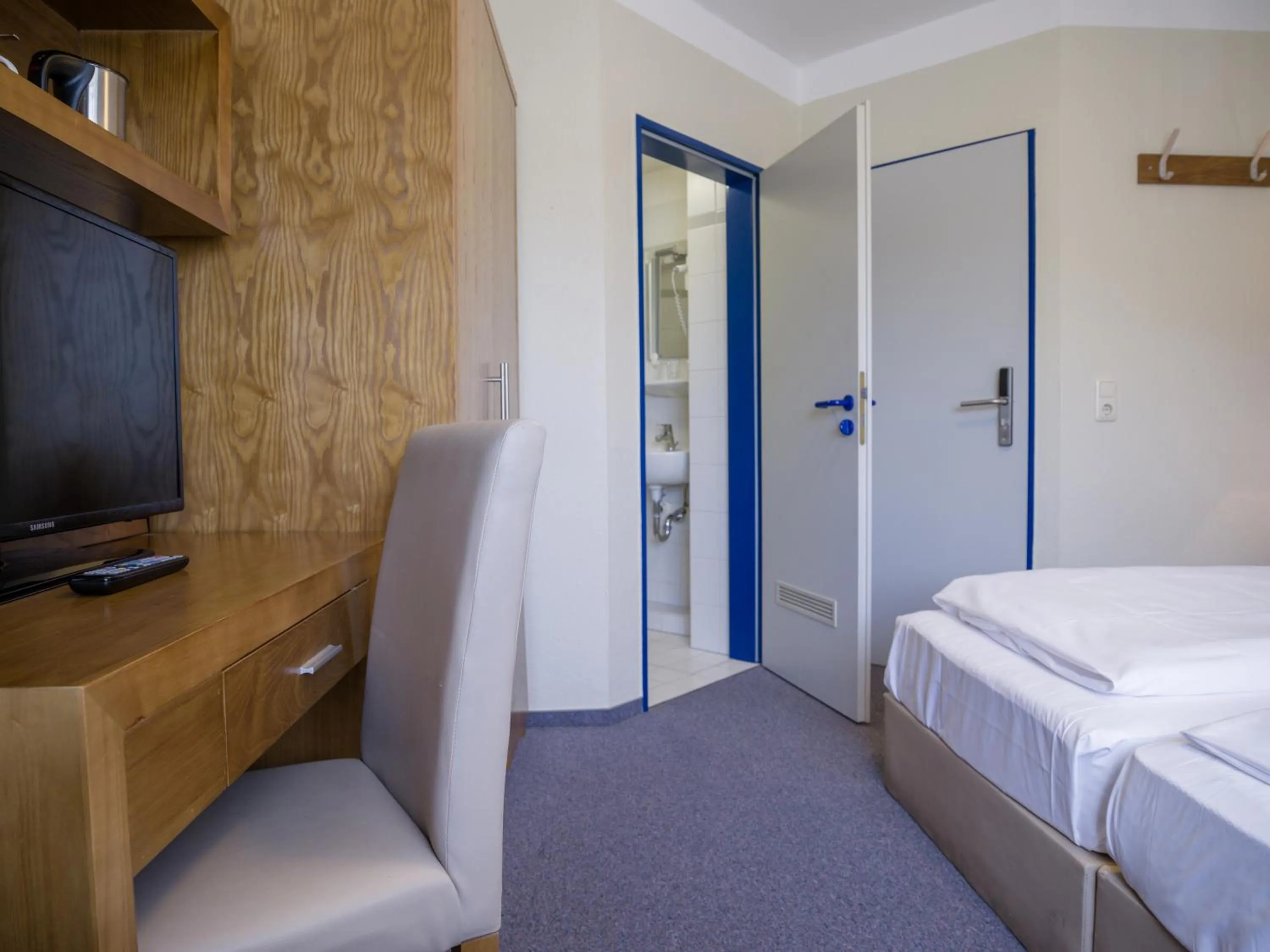 Photo of the whole room, Bed in Hotel Königstein Kiel by Tulip Inn