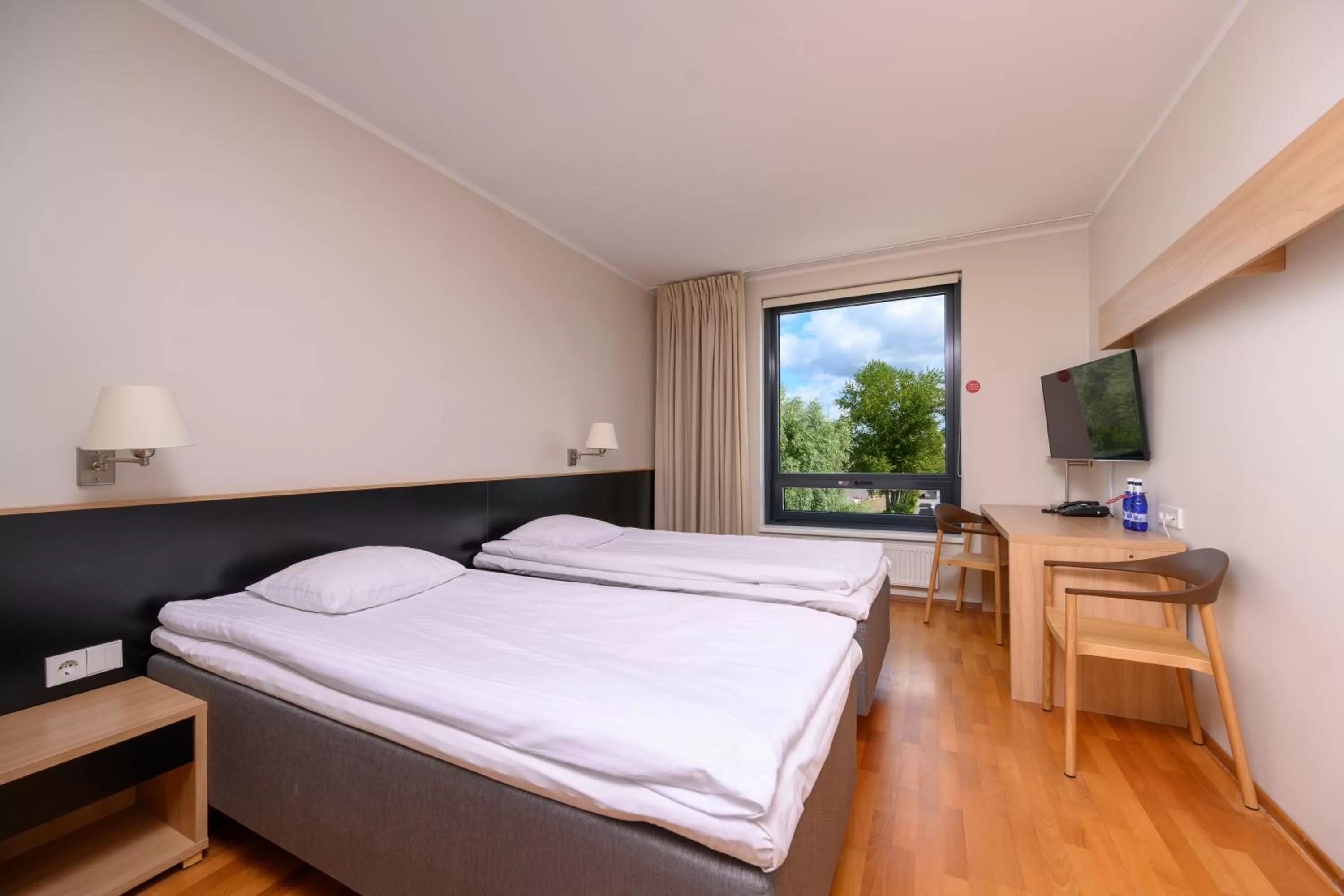 TV and multimedia, Bed in Dorpat Hotel