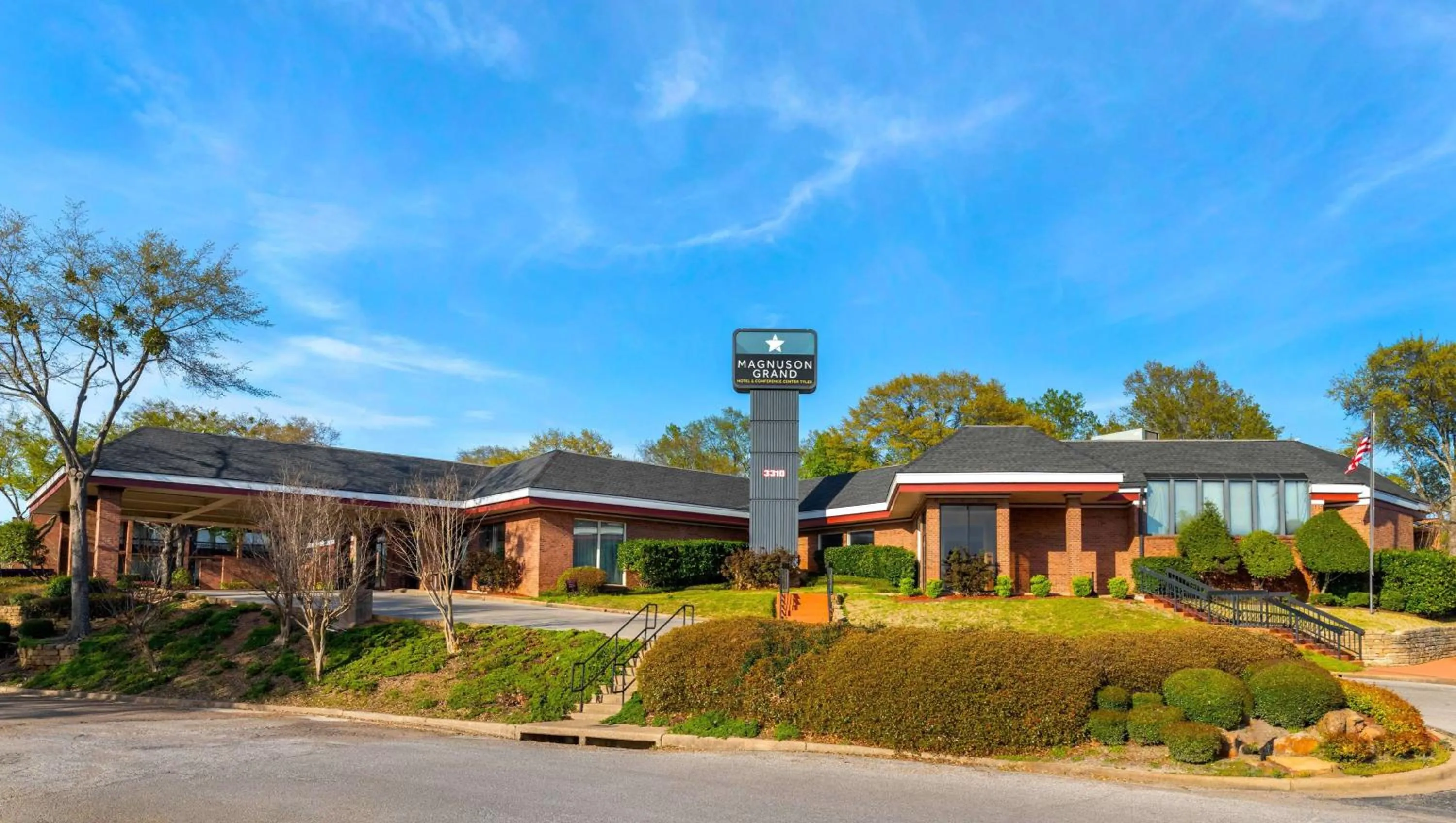Property building in Magnuson Grand Hotel and Conference Center Tyler