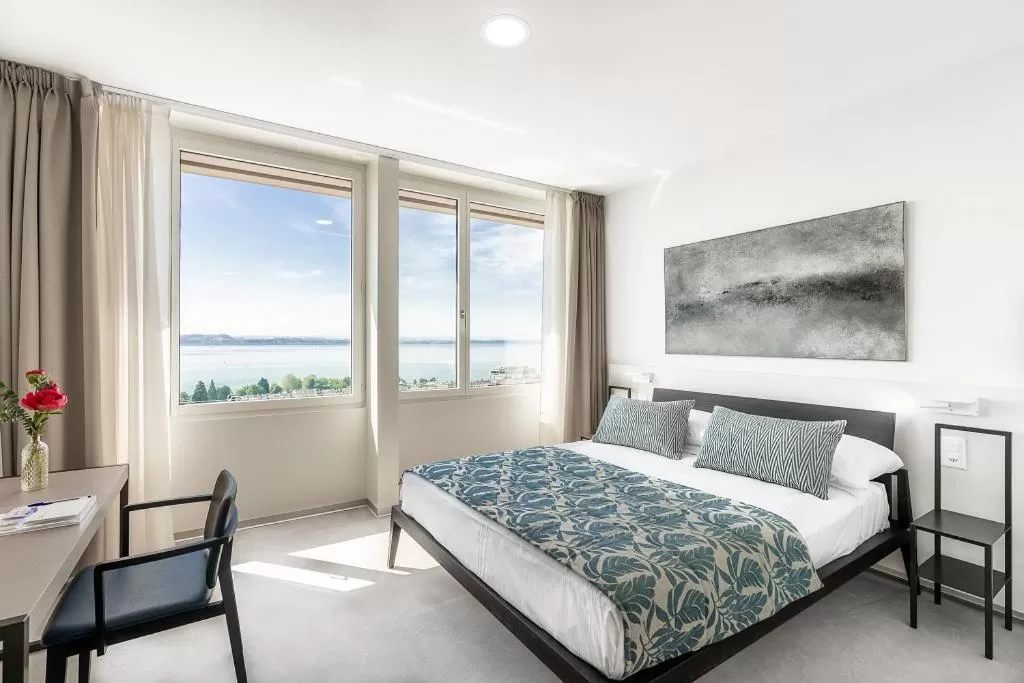 Photo of the whole room, Bed in Hôtel Alpes & Lac