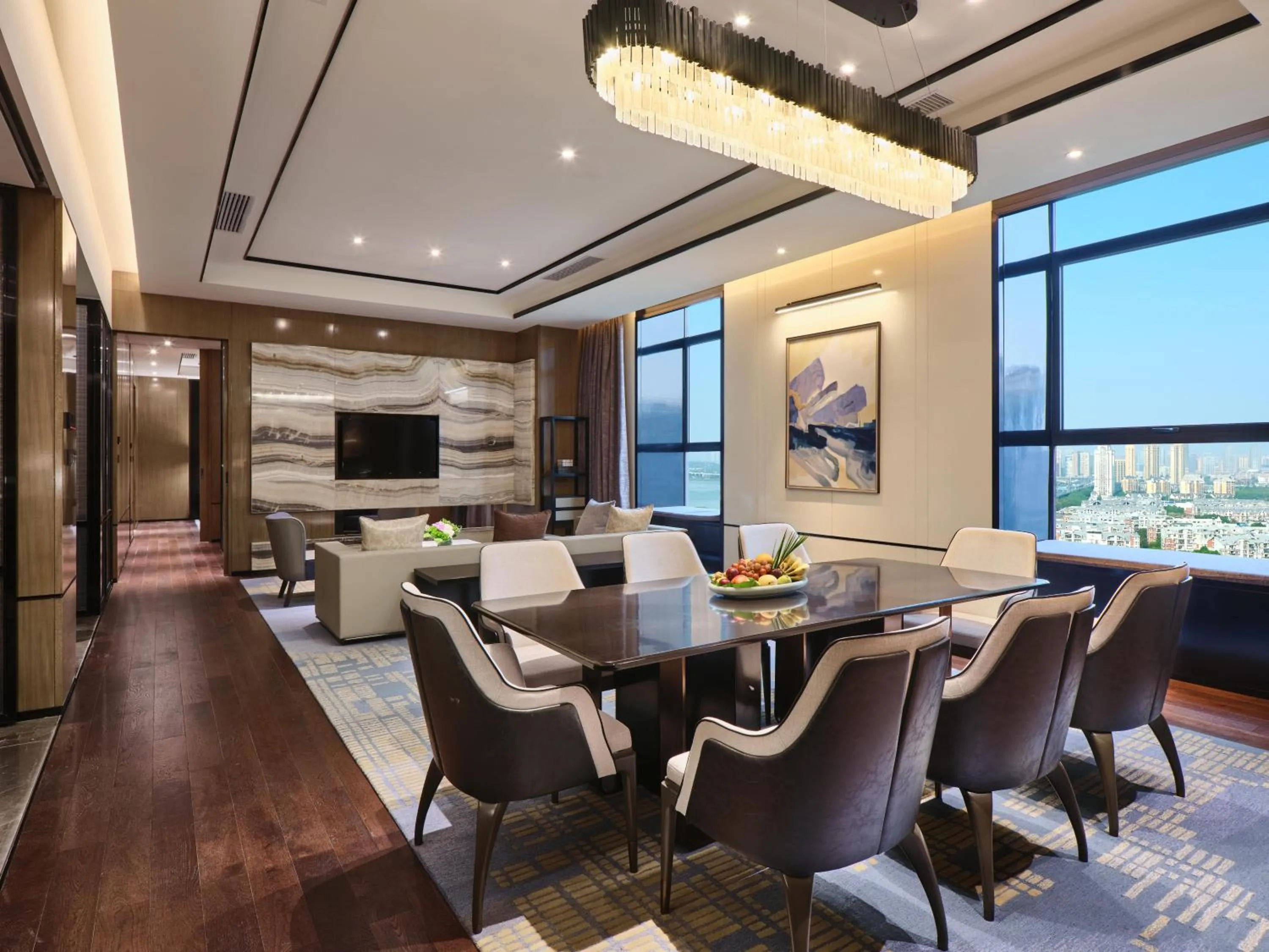 Communal lounge/ TV room in Crowne Plaza Wuhan Development Zone by IHG