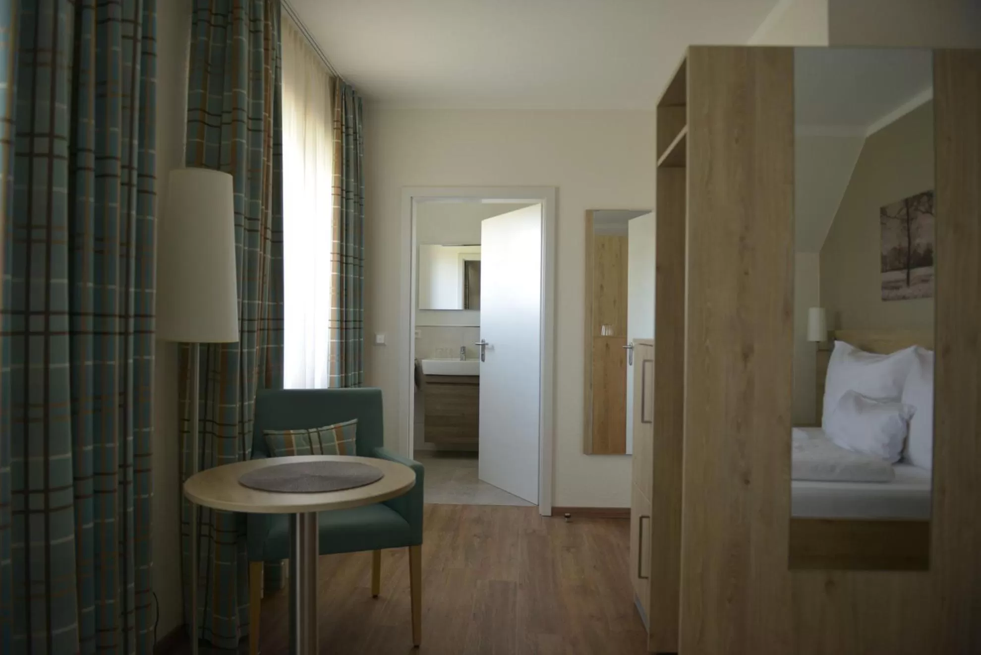 Photo of the whole room, Bed in Gästehaus Rothert