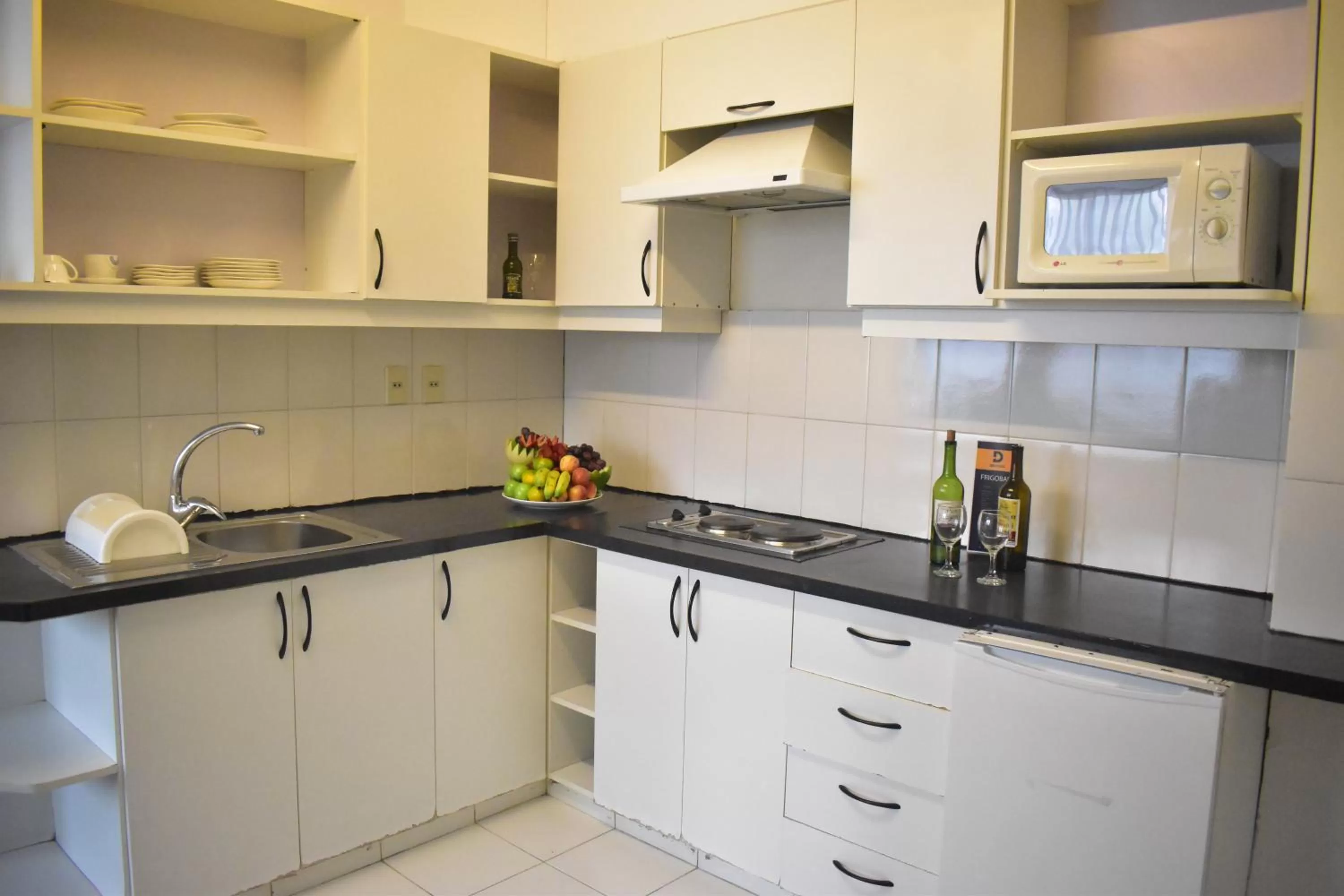 Kitchen or kitchenette in Delfines Apart Hotel