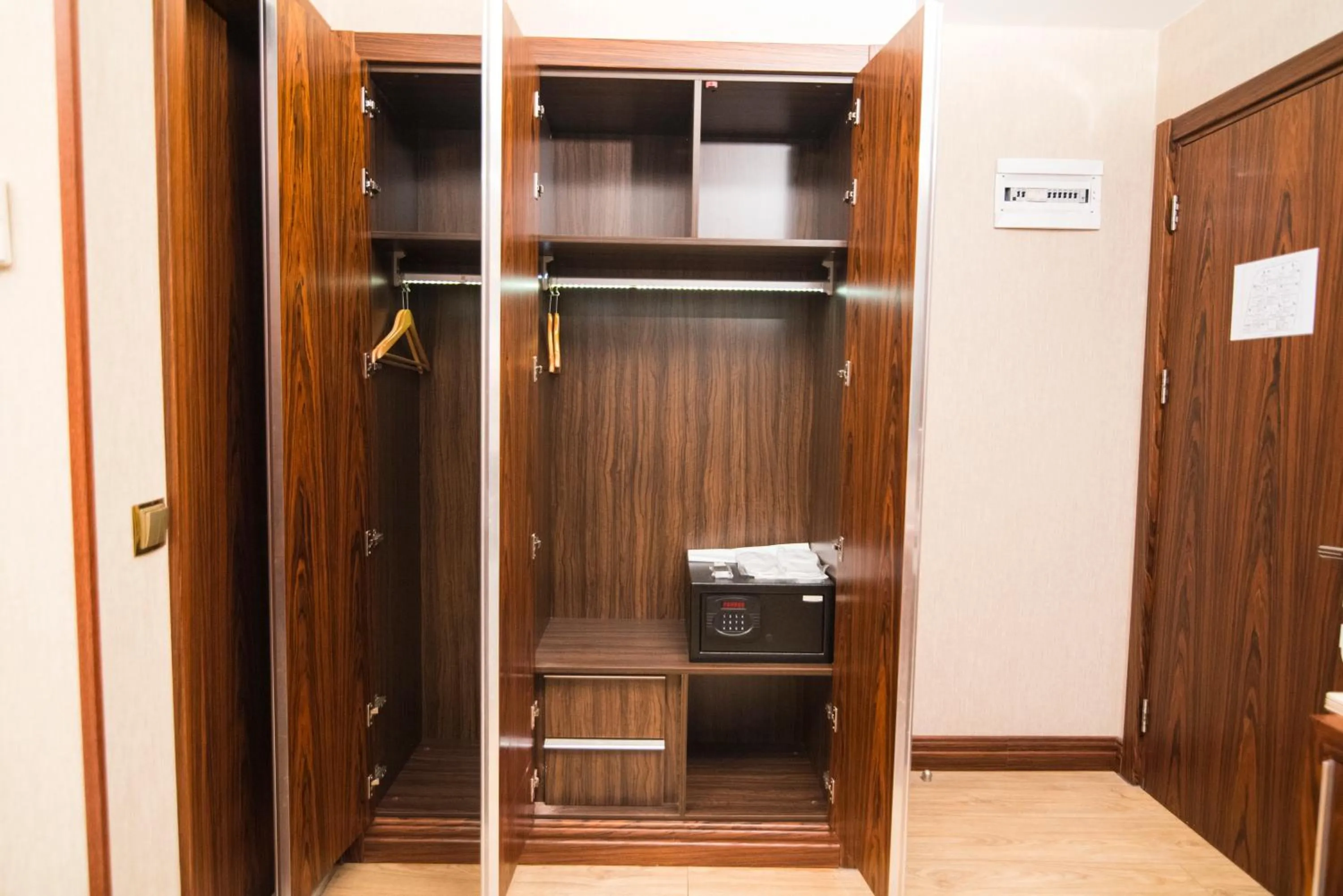 wardrobe in MidMar Deluxe Hotel